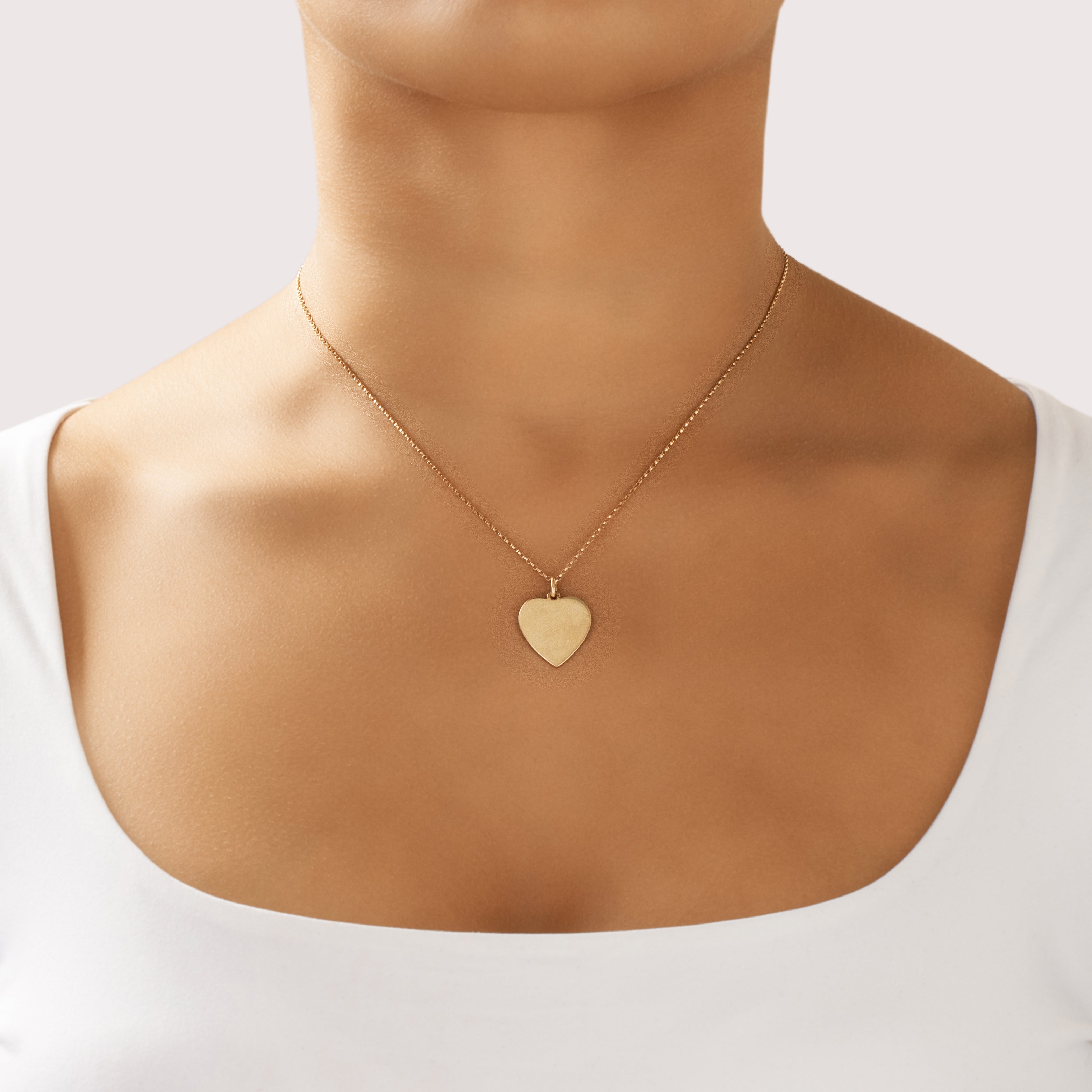 Vintage 14k Yellow Gold Gleaming Simple Heart Charm / Pendant - On model view