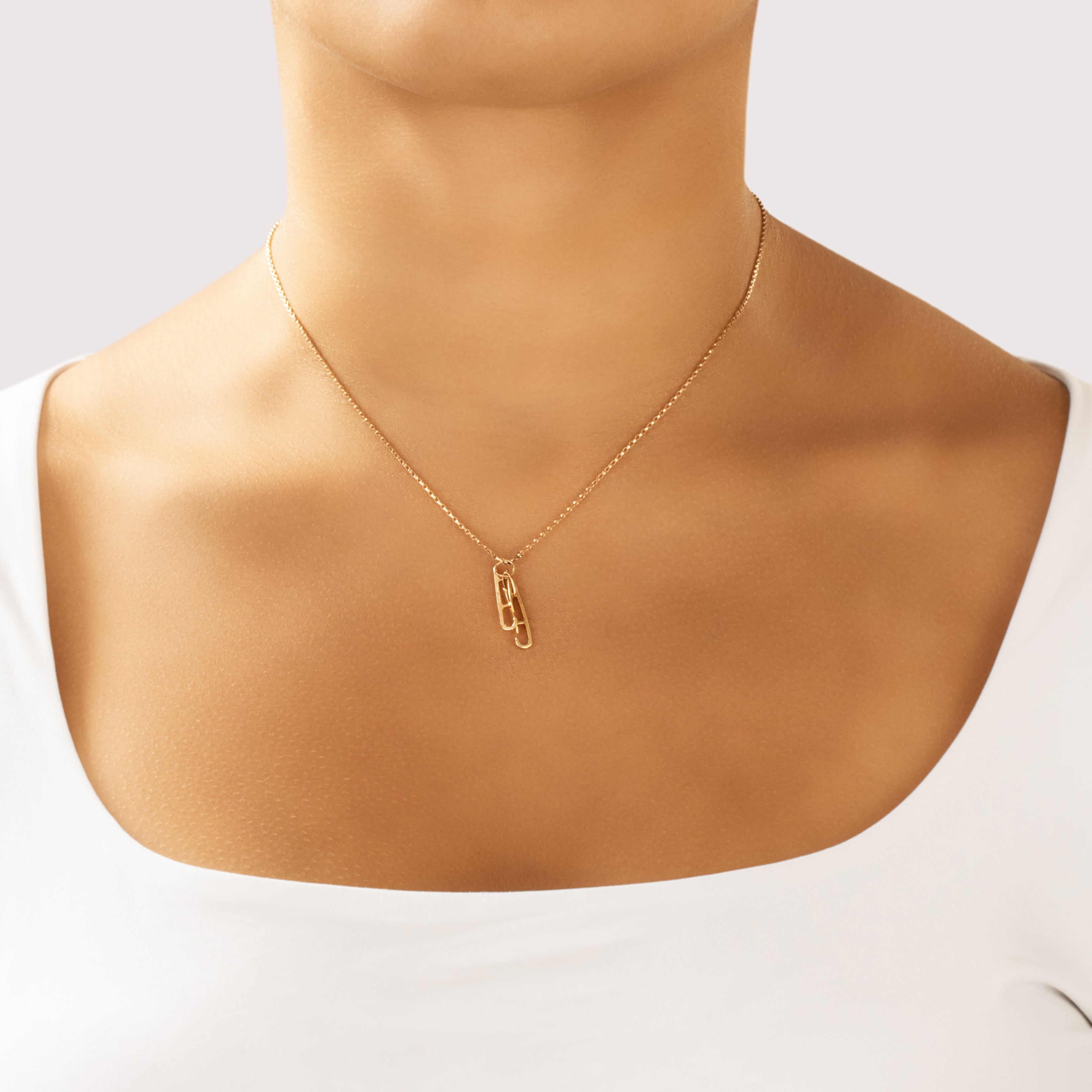 Vintage 14k Yellow Gold Old-Fashioned Ice Skates Charm / Pendant - On model view
