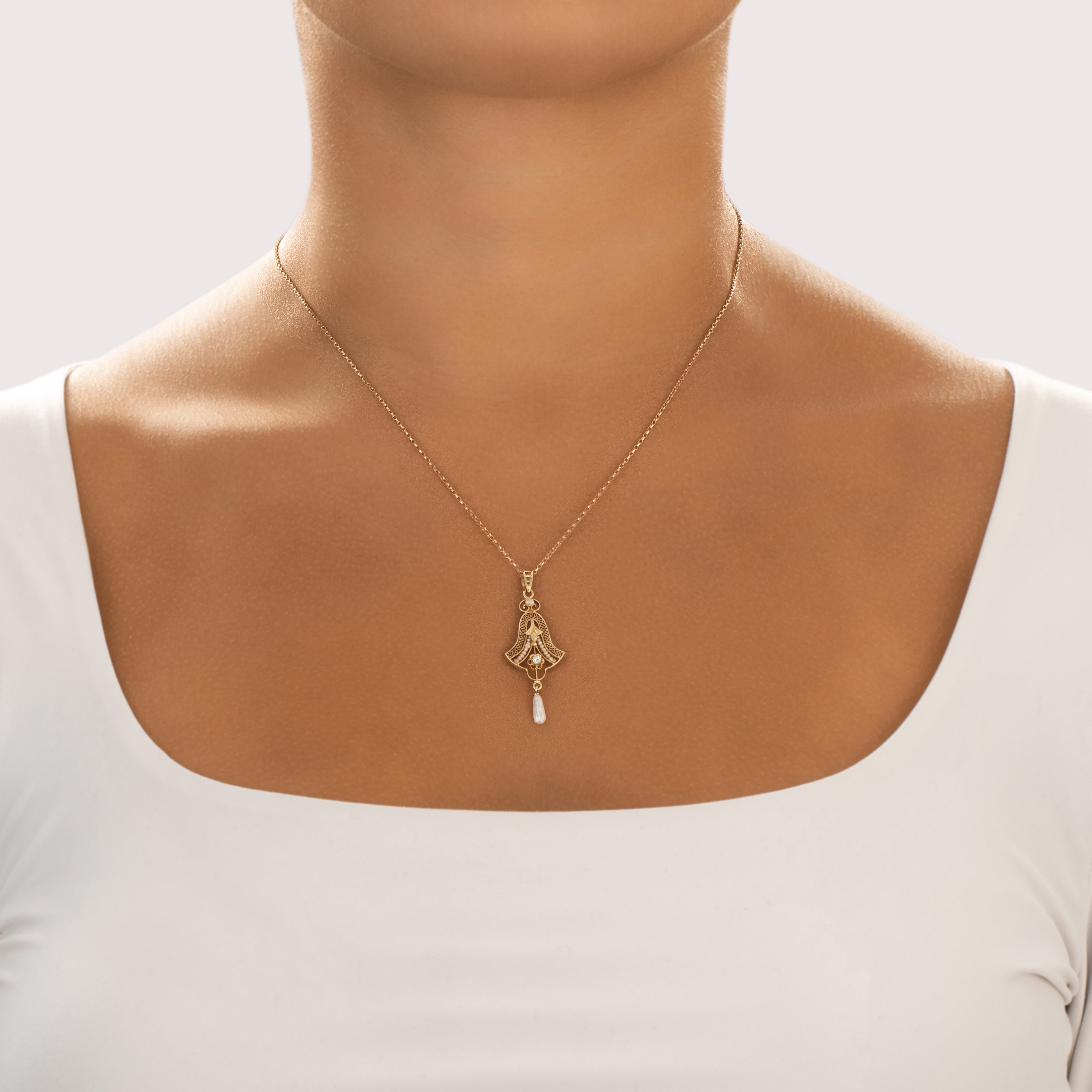 Antique 10k Yellow Gold Old Mine Cut Diamond Baroque Pearl Seed Pearl Intricate Filigree Buttercup Pendant - On model view