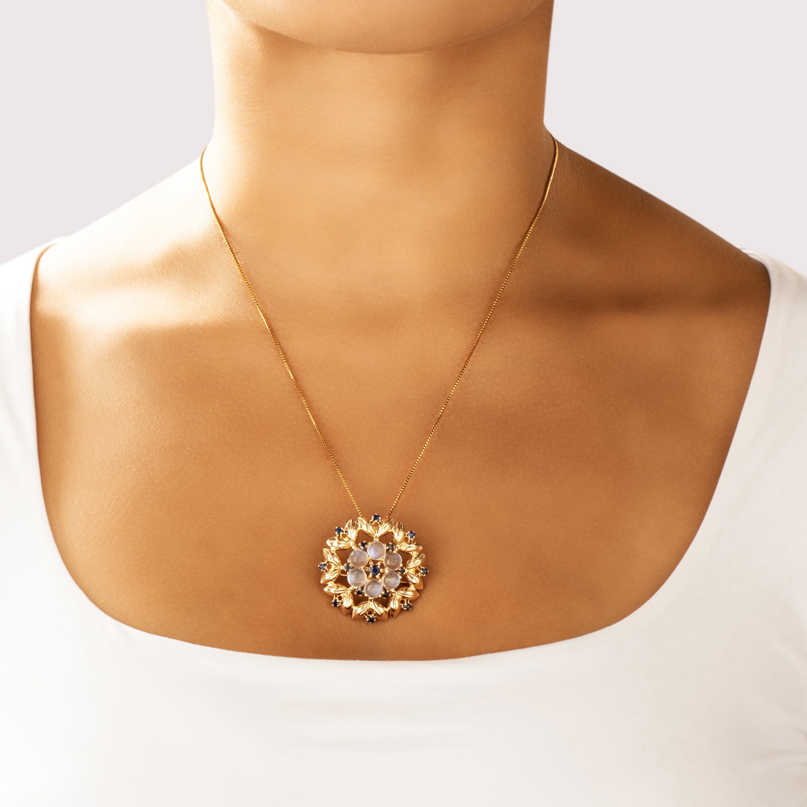 Vintage 14k Yellow Gold 5.03cttw Moonstone .79cttw Blue Sapphire Beautiful Glowing Floral Pin / Pendant - On model view