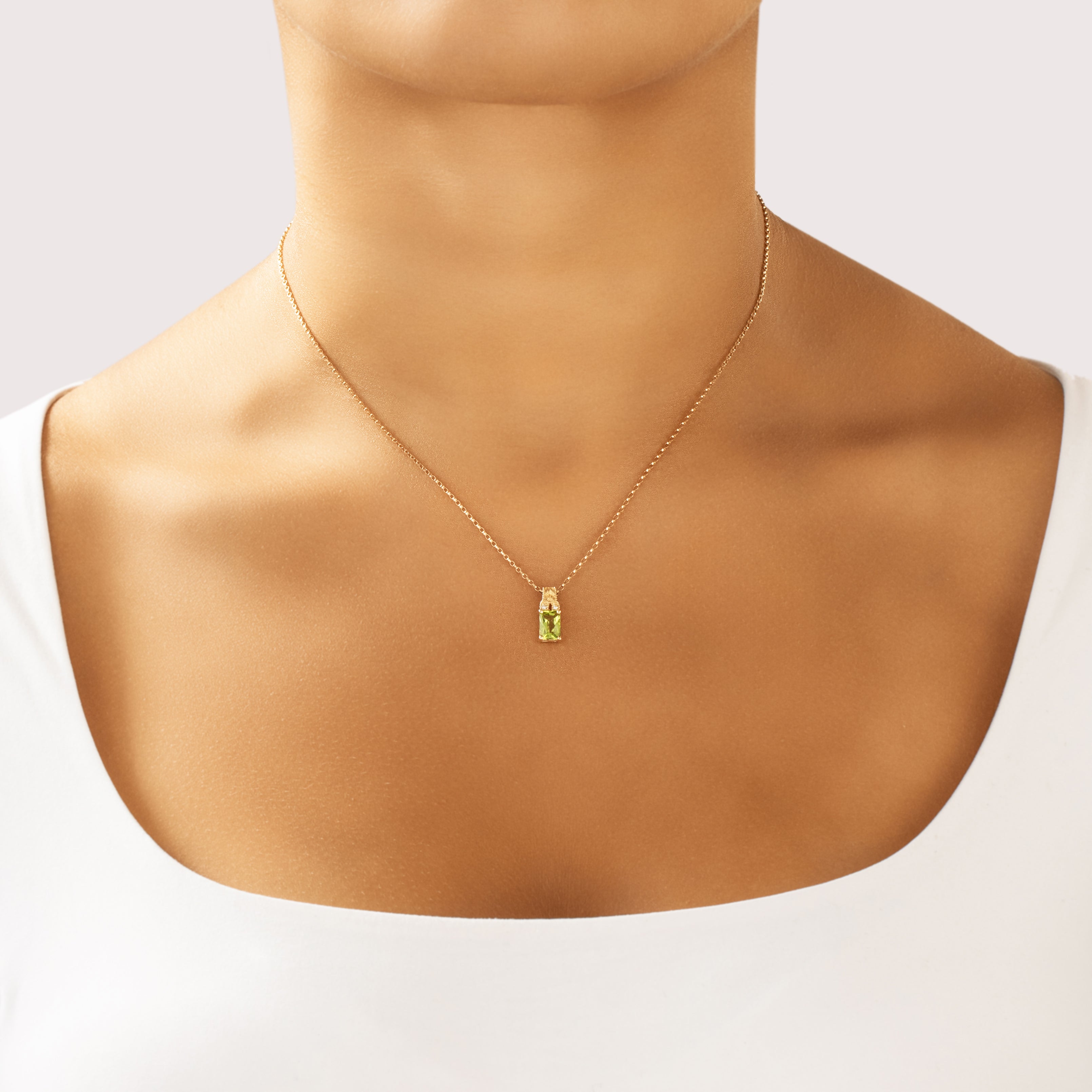 Vintage Small 14k Yellow Gold 1.0ct Peridot Diamond Sculptural Drop Pendant - On model view