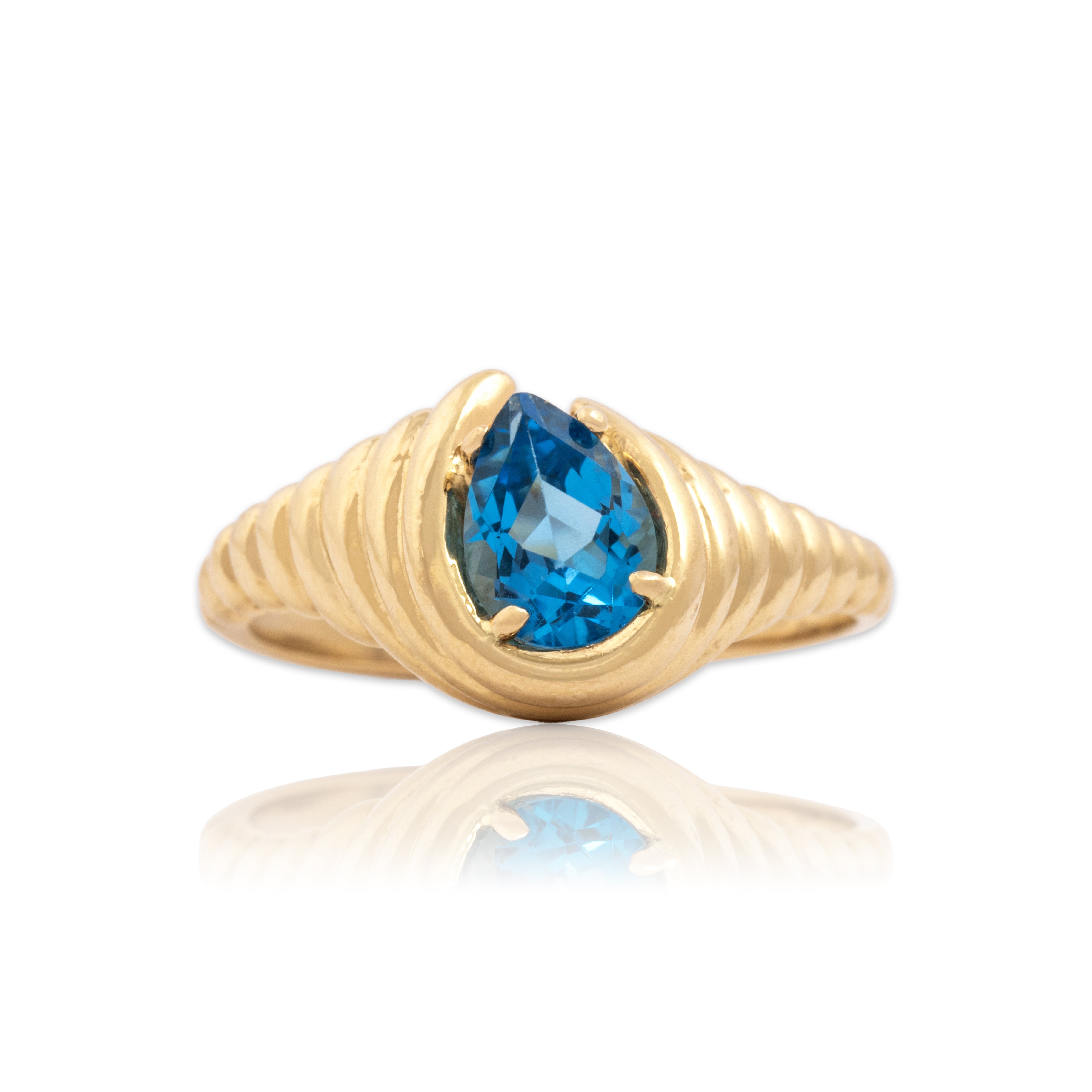 Vintage 14k Yellow Gold .82ct Blue Topaz Ribbed Diagonal Pear Ring - Close-up view