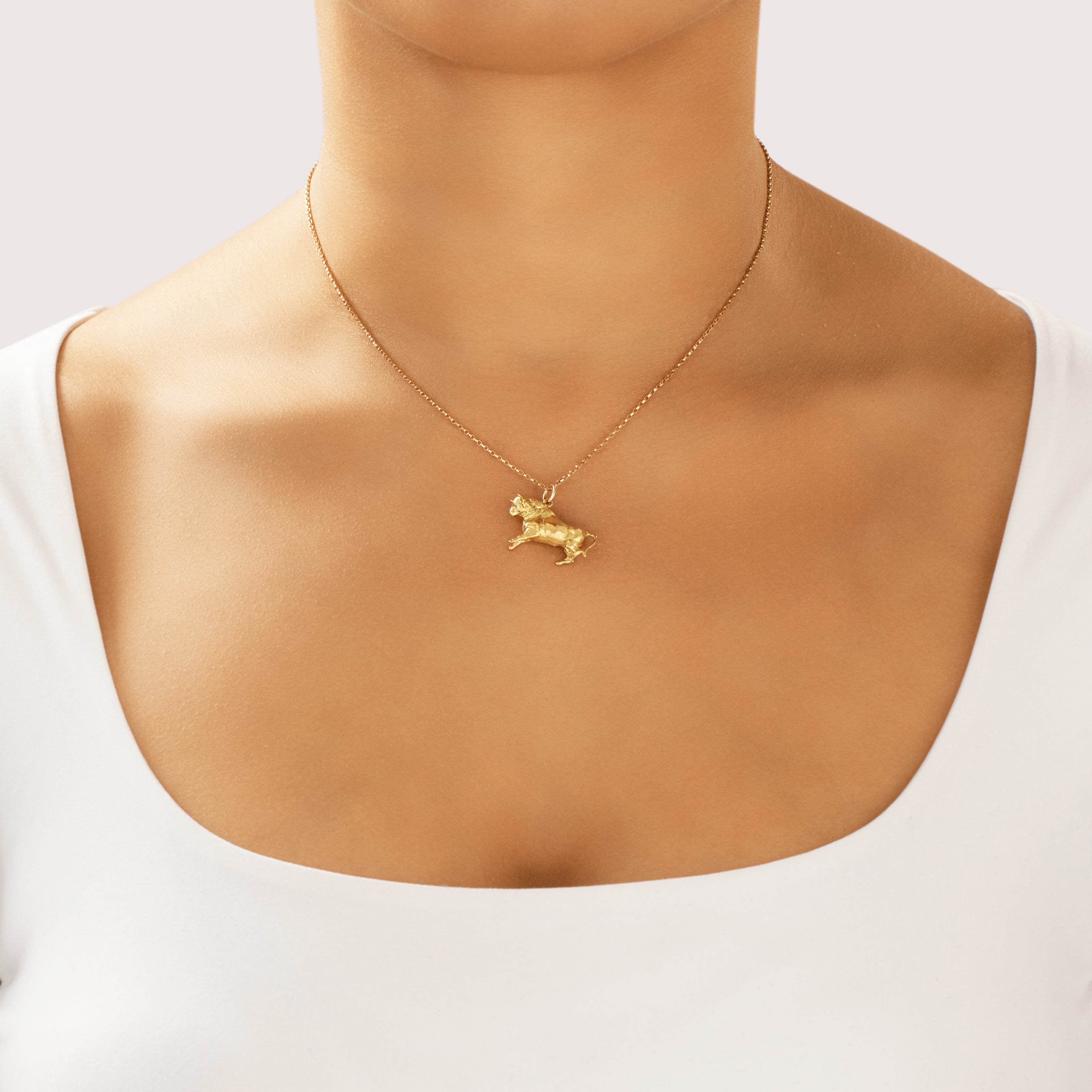 Vintage 18k Yellow Gold Dimensional Charging Bull Charm / Pendant - On model view