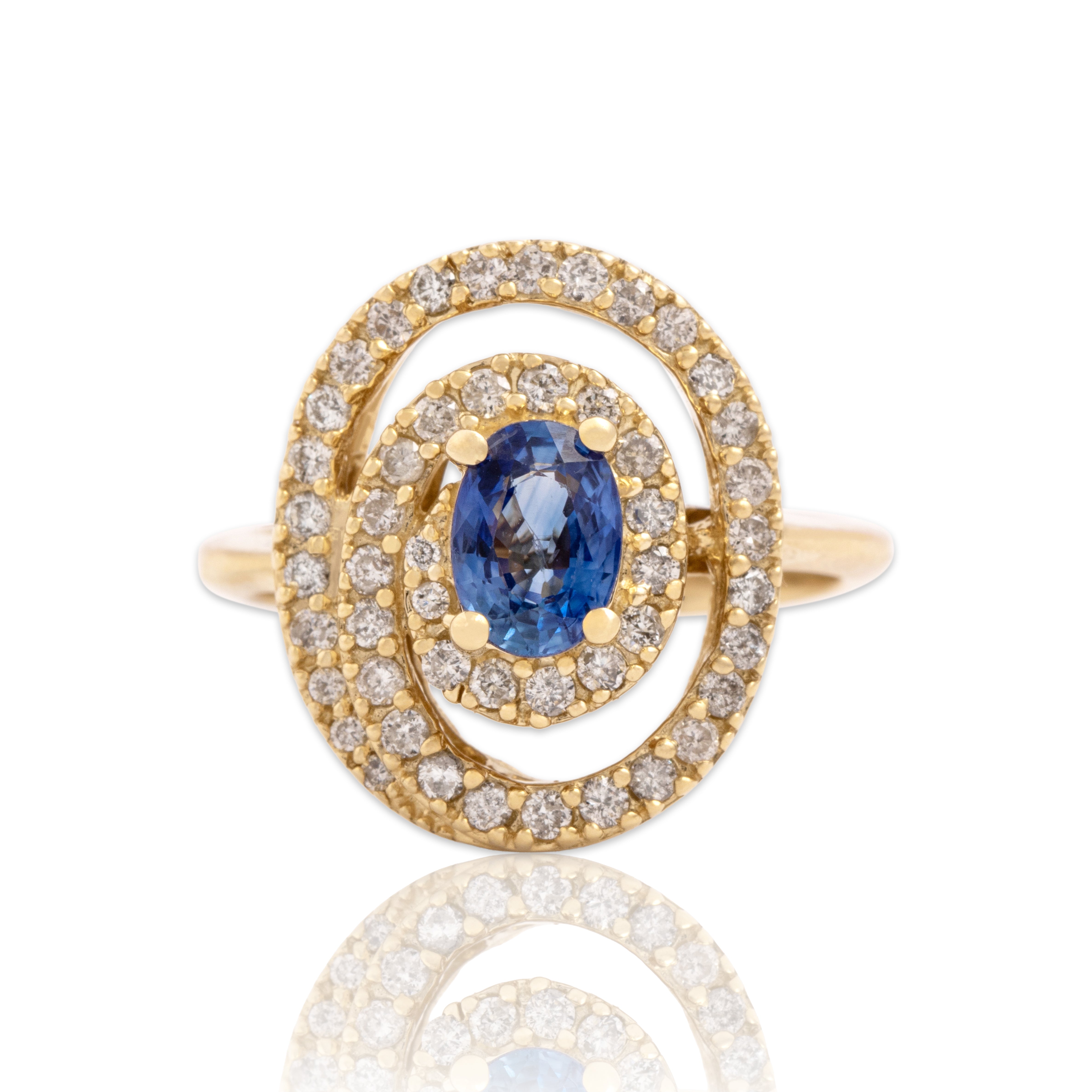 Vintage 14k Yellow Gold .69ct Blue Sapphire Diamond Dazzling Swirling Oval Halo Ring - Close-up view