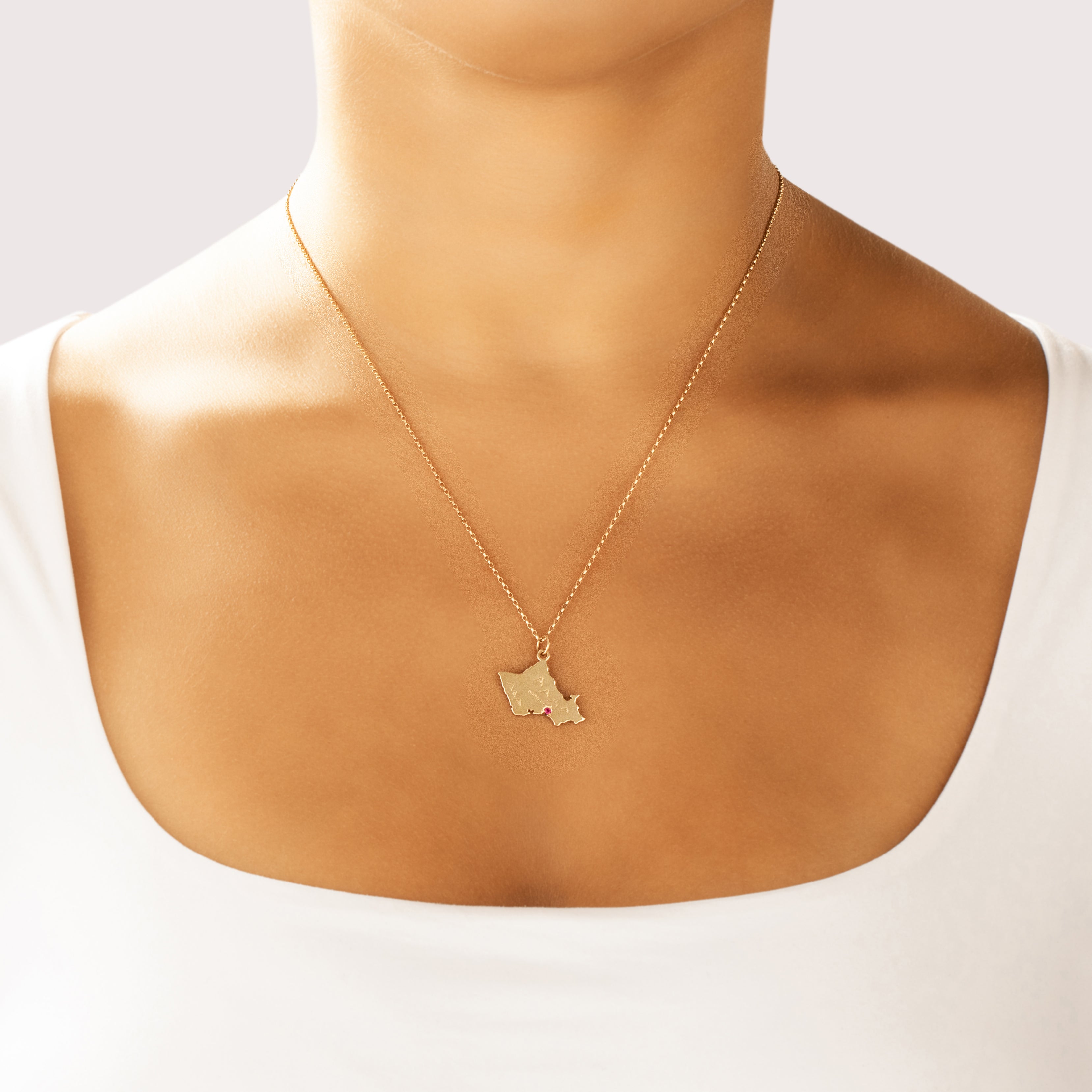 Vintage 14k Yellow Gold Synthetic Ruby Honolulu, Oahu Map Charm / Pendant - On model view