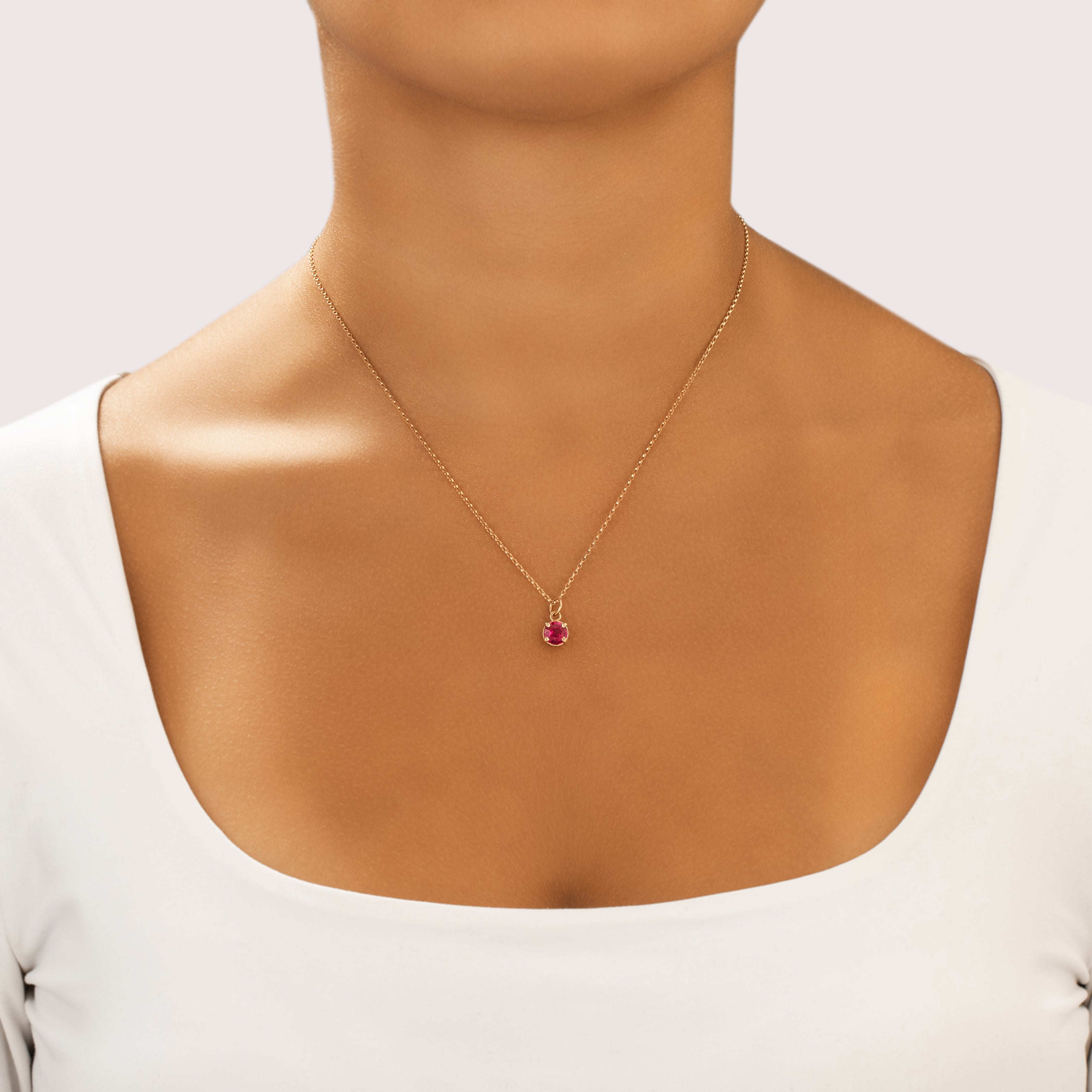 Vintage Small 14k Yellow Gold 1.09ct Synthetic Ruby Vibrant Solitaire Charm / Pendant - On model view