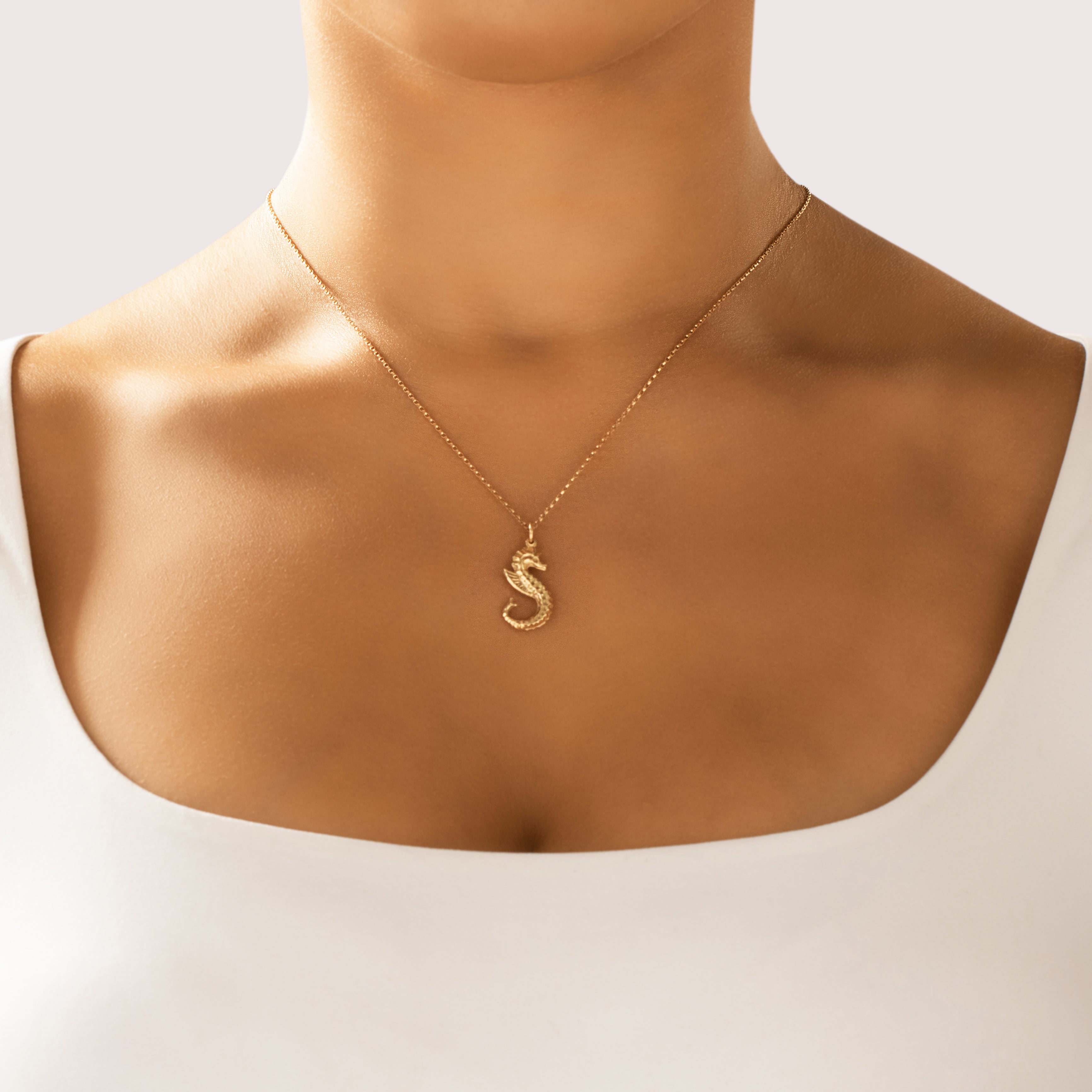 Vintage 14k Yellow Gold Swimming Seahorse Charm / Pendant - On model view