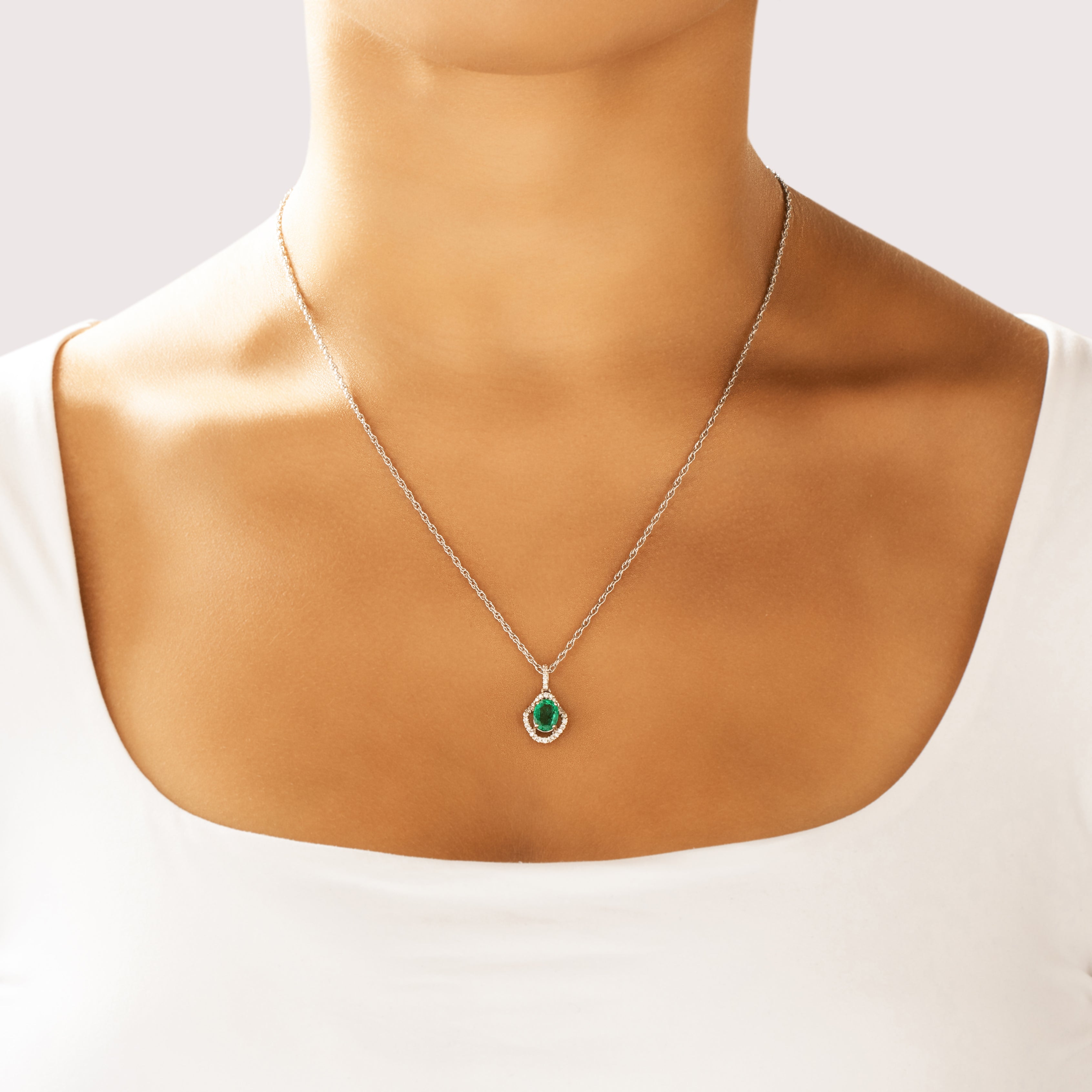 Vintage 18k White Gold .98ct Emerald Diamond Dazzling Waving Halo Pendant - On model view