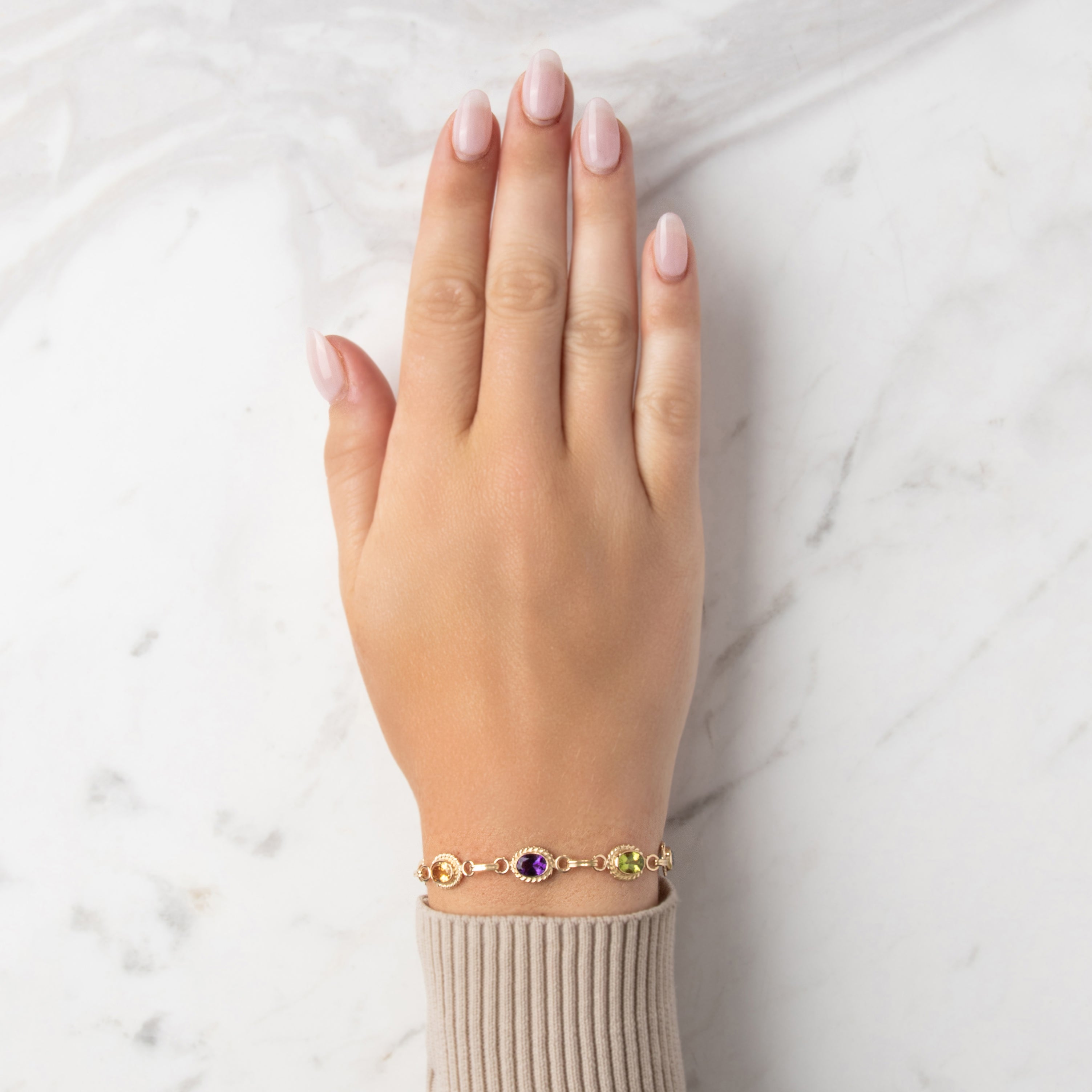 Vintage 14k Yellow Gold 1.71cttw Red Pink Garnet 1.64cttw Peridot .98ct Blue Topaz .65ct Amethyst .62ct Citrine Rainbow Bracelet - On model view