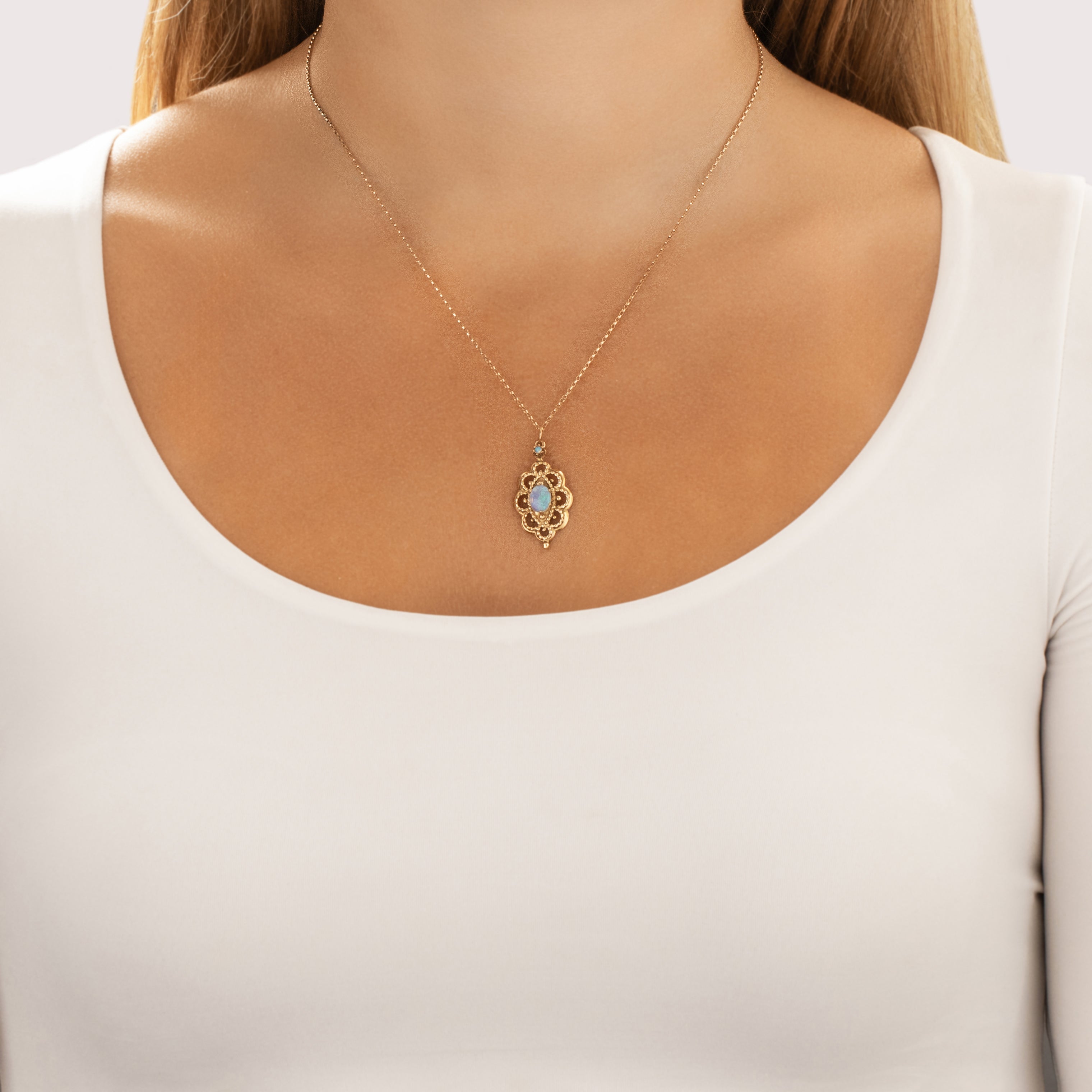 Vintage 14k Yellow Gold Opal Luminous Cable Framed Cabochon Pendant - On model view