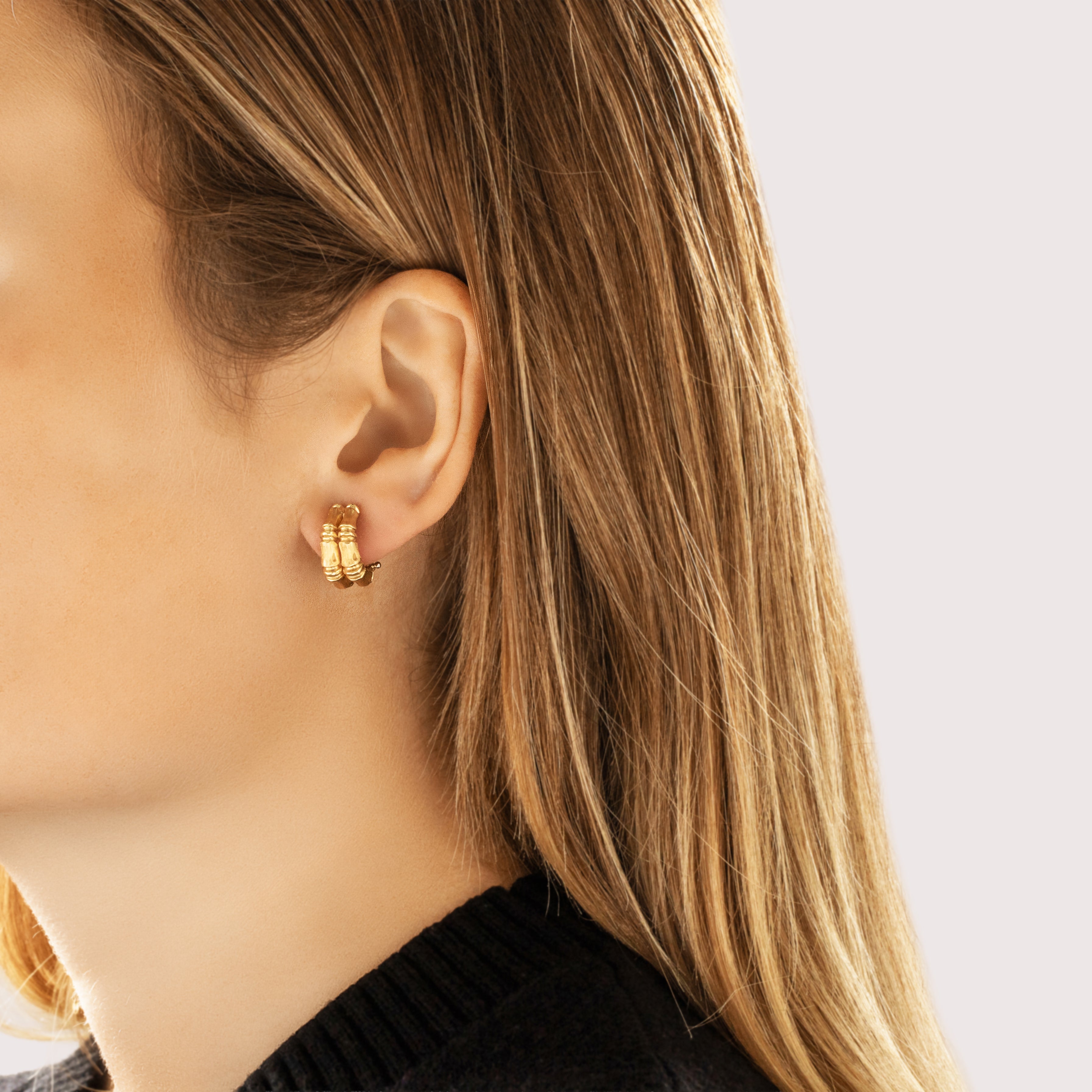 Vintage 14k Yellow Gold Chic Textured Bamboo Omega Back Earrings - On model view