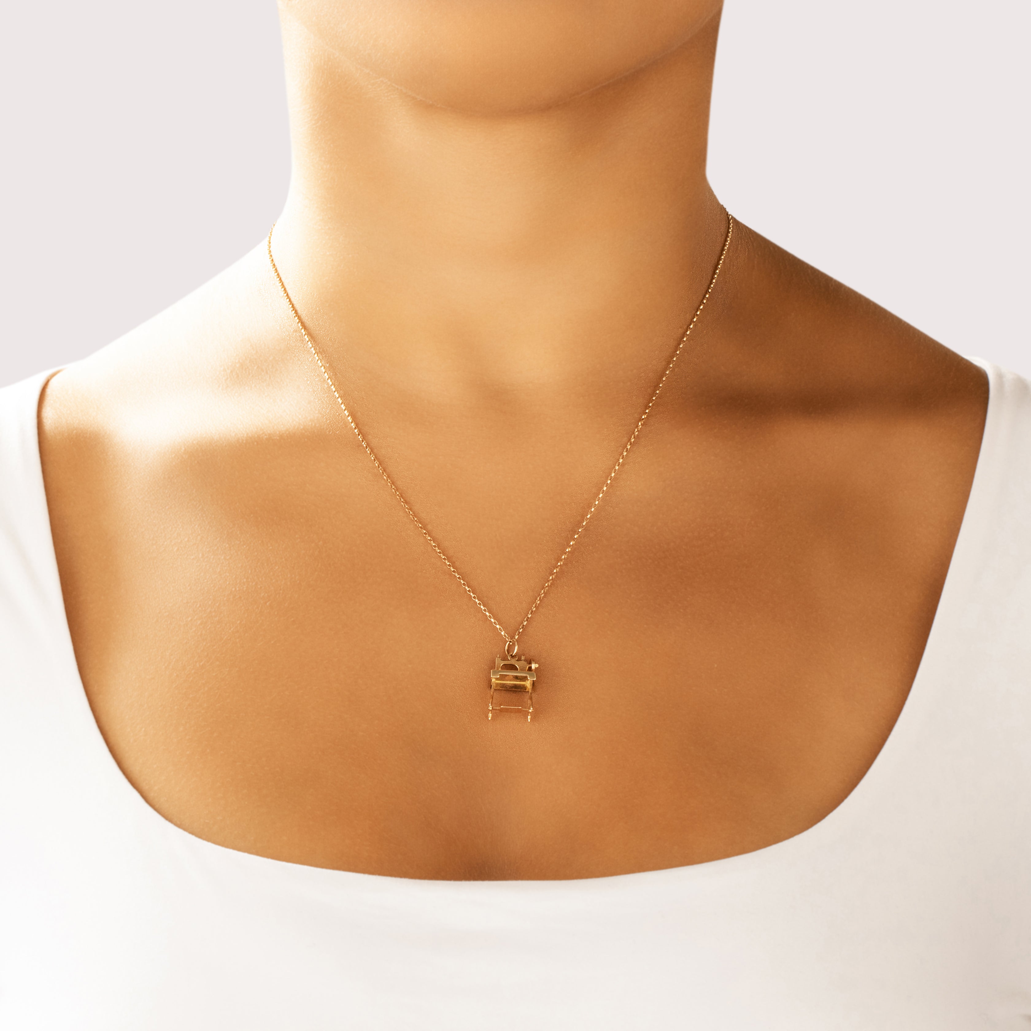 Vintage 14k Yellow Gold Dimensional Tabletop Sewing Machine Charm / Pendant - On model view