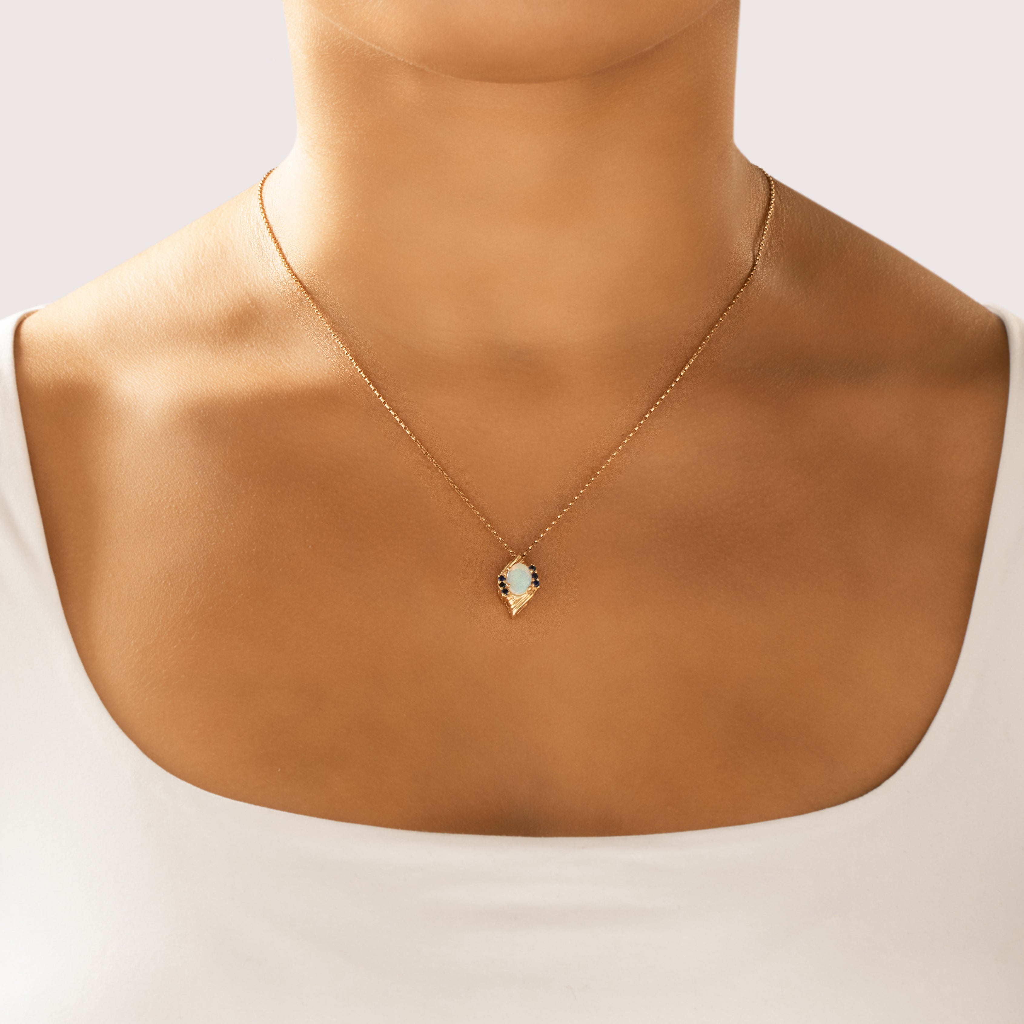 Vintage 14k Yellow Gold .5ct Opal Blue Sapphire Ribbed Accented Cabochon Pendant - On model view