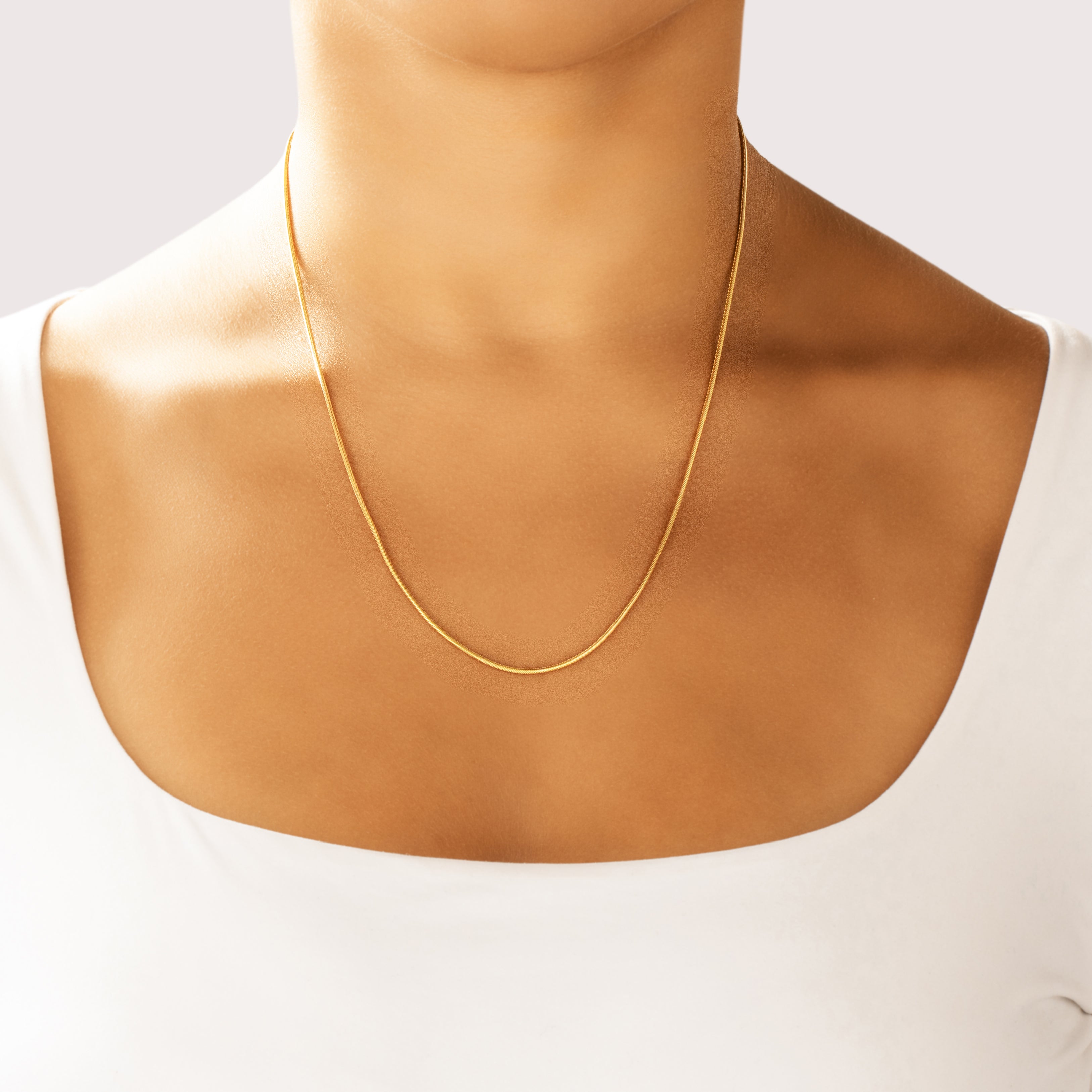 Vintage Italian 14k Yellow Gold 1.4mm Sleek Snake Chain - On model view