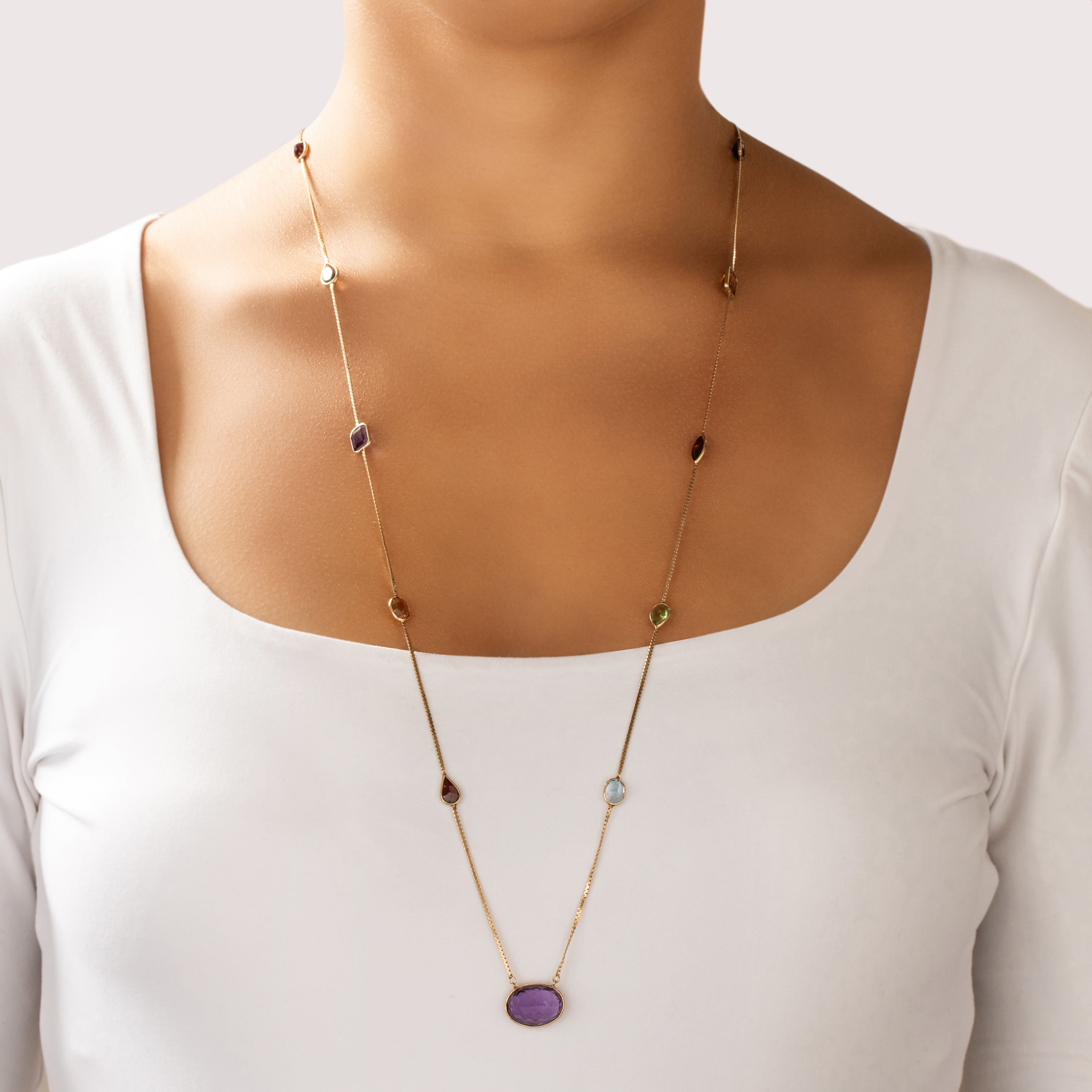 Vintage 14k Yellow Gold 10.51cttw Amethyst 2.79cttw Garnet 2.64cttw Citrine 1.37ct Blue Topaz .93ct Smoky Quartz .86ct Peridot Long Multi-Cut Bezel Station Necklace - On model view