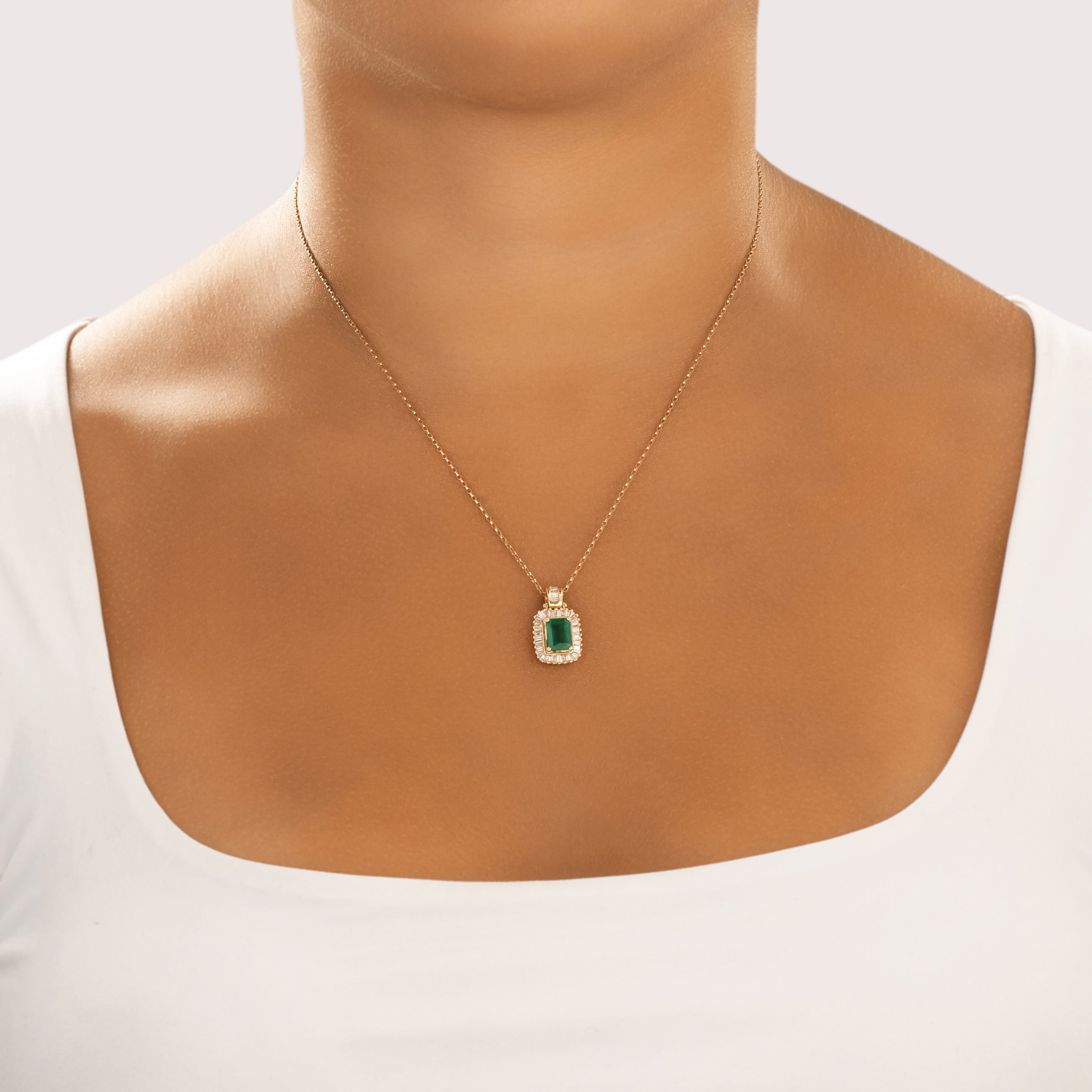 Vintage 14k Yellow Gold 1.3ct Emerald Diamond Glittering Baguette Halo Pendant - On model view