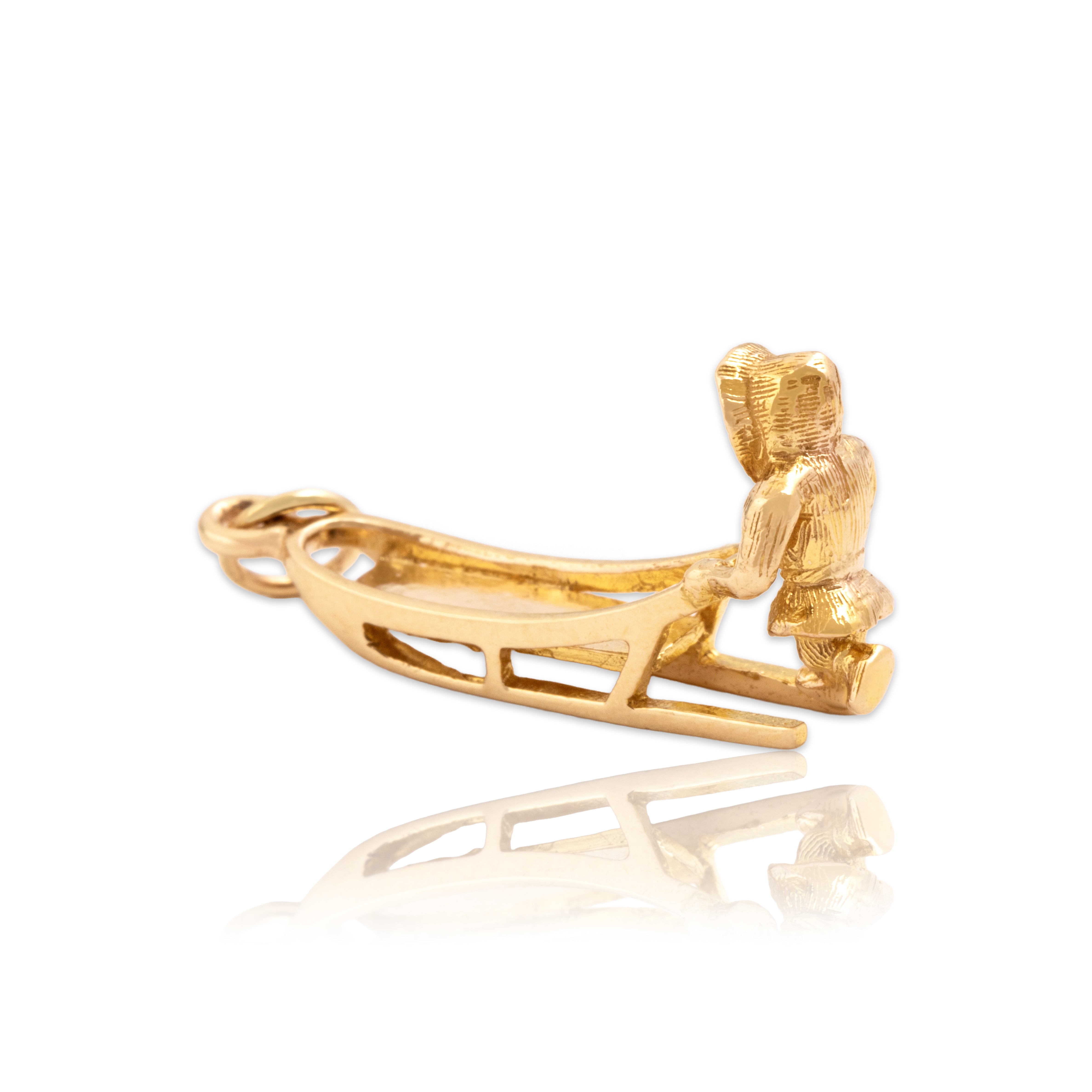 Vintage 10k Yellow Gold Inuit Sledder Charm / Pendant - Close-up view