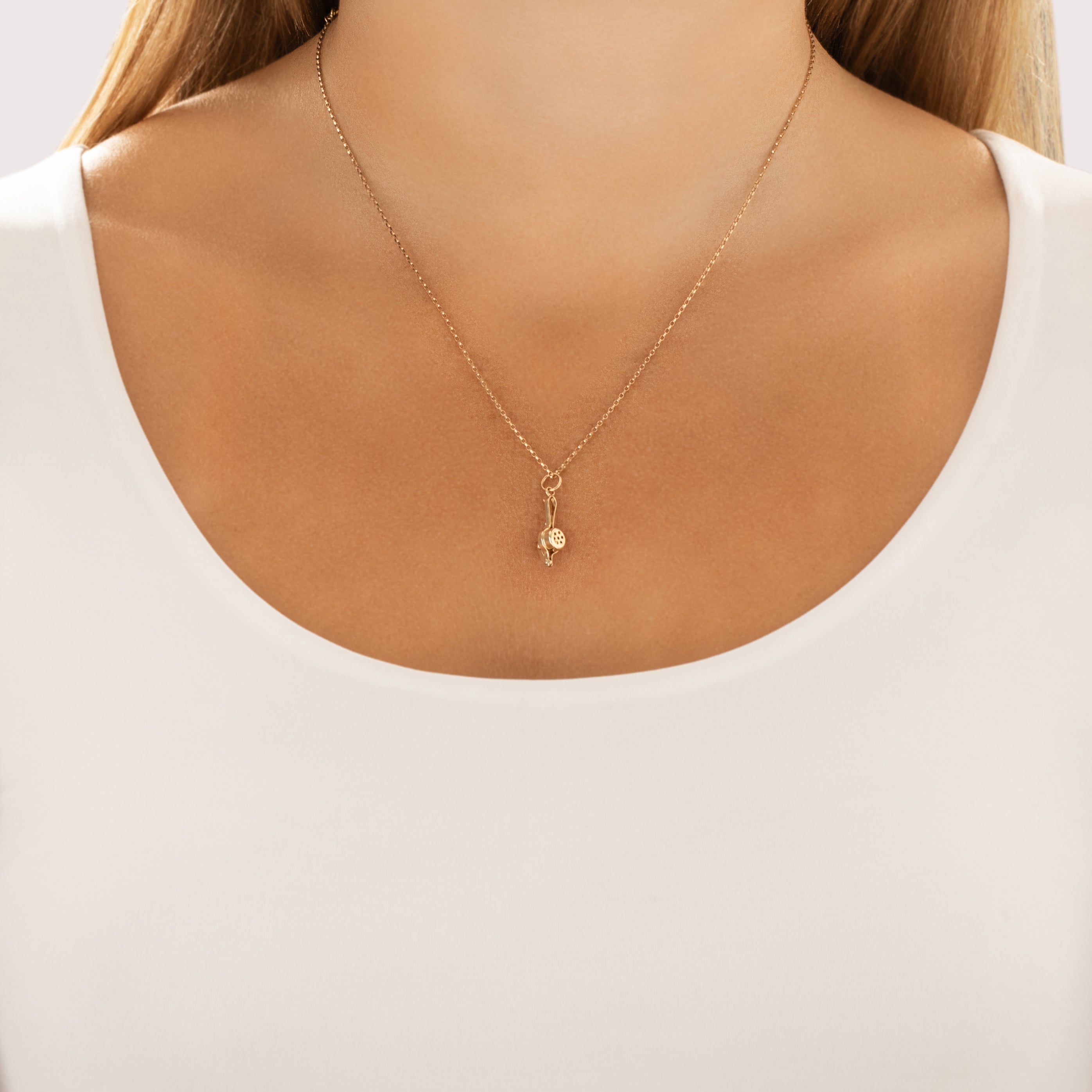 Vintage Small 14k Yellow Gold Zesty Citrus Press Charm / Pendant - On model view
