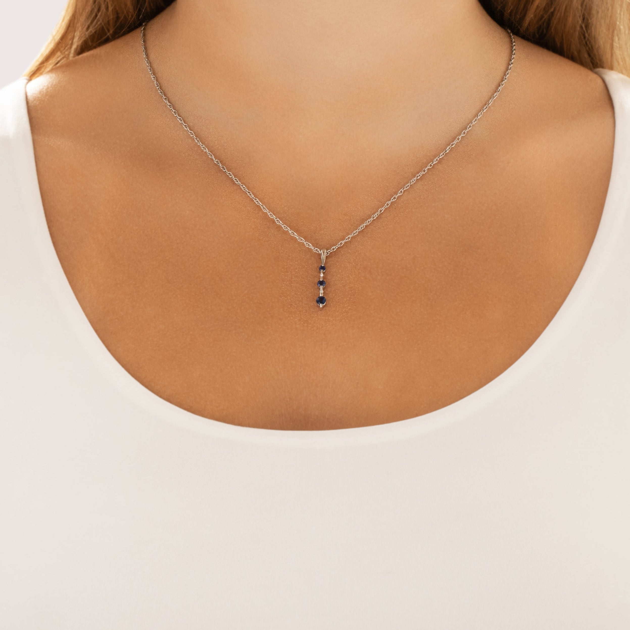 Vintage 14k White Gold Blue Sapphire Diamond Sleek Graduated Drop Pendant - On model view