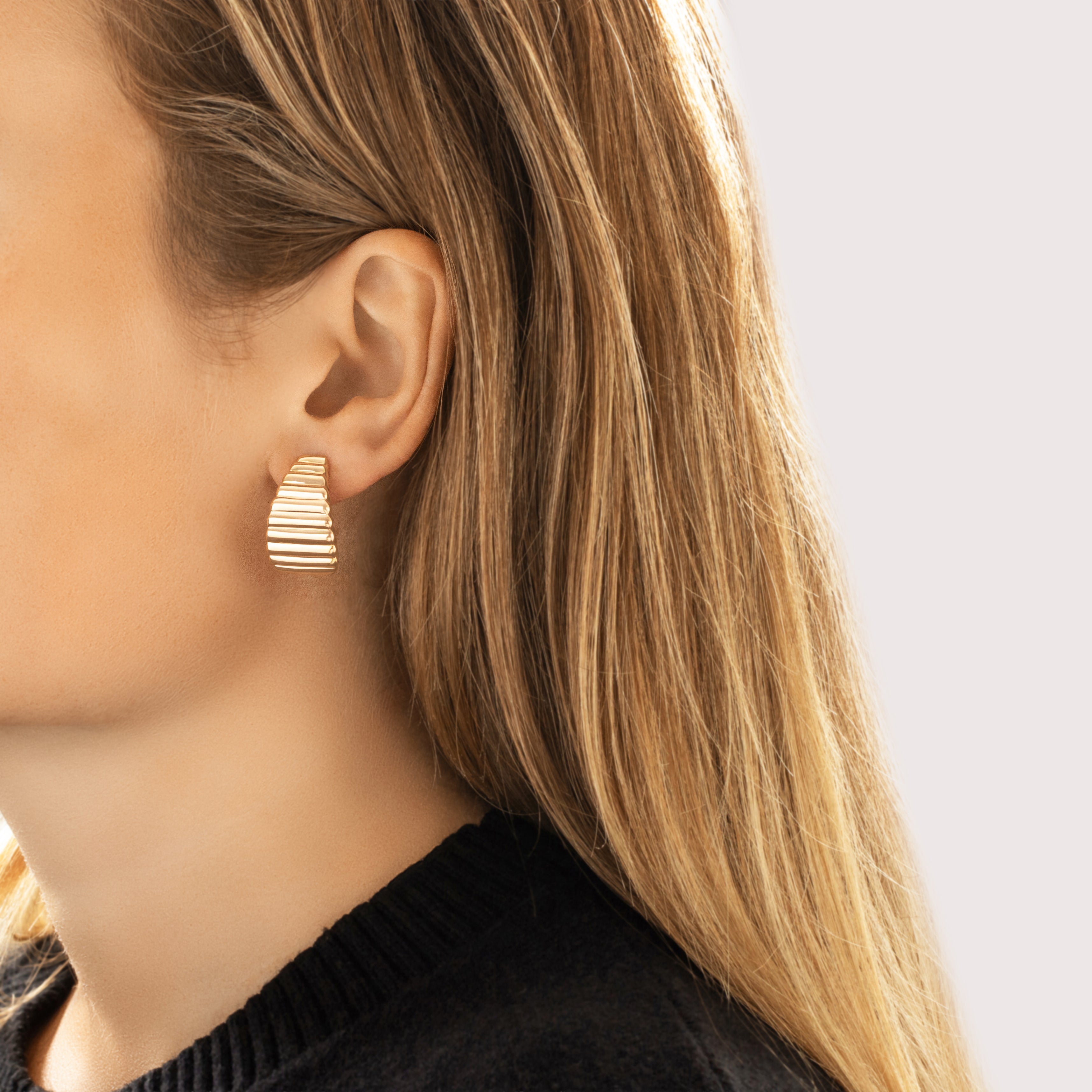 Vintage Lightweight 14k Yellow Gold Curved Puffy Ribbed Statement Stud Earrings - On model view