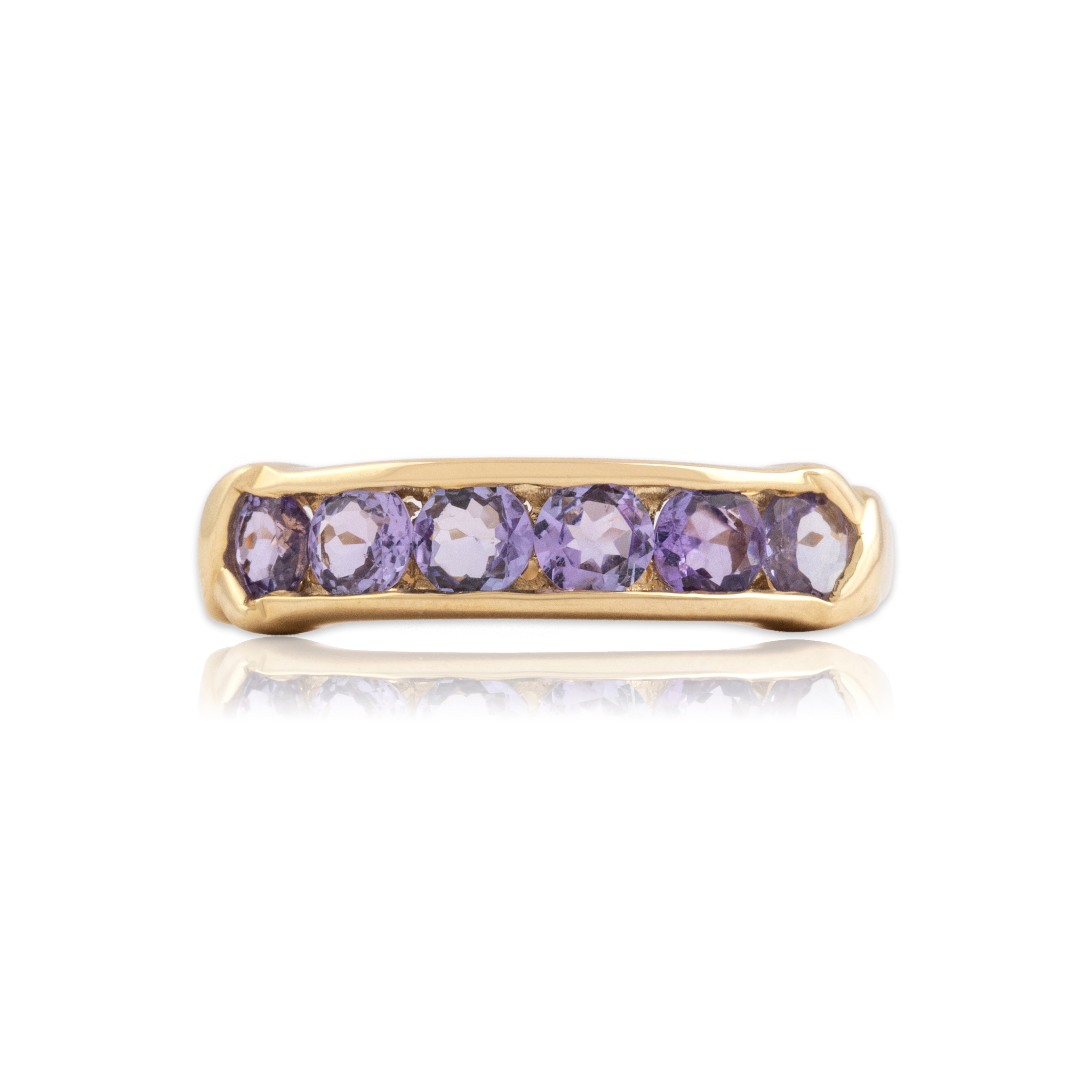 Vintage 14k Yellow Gold .84cttw Tanzanite Knot Accent Channel Bar Band Ring - Close-up view
