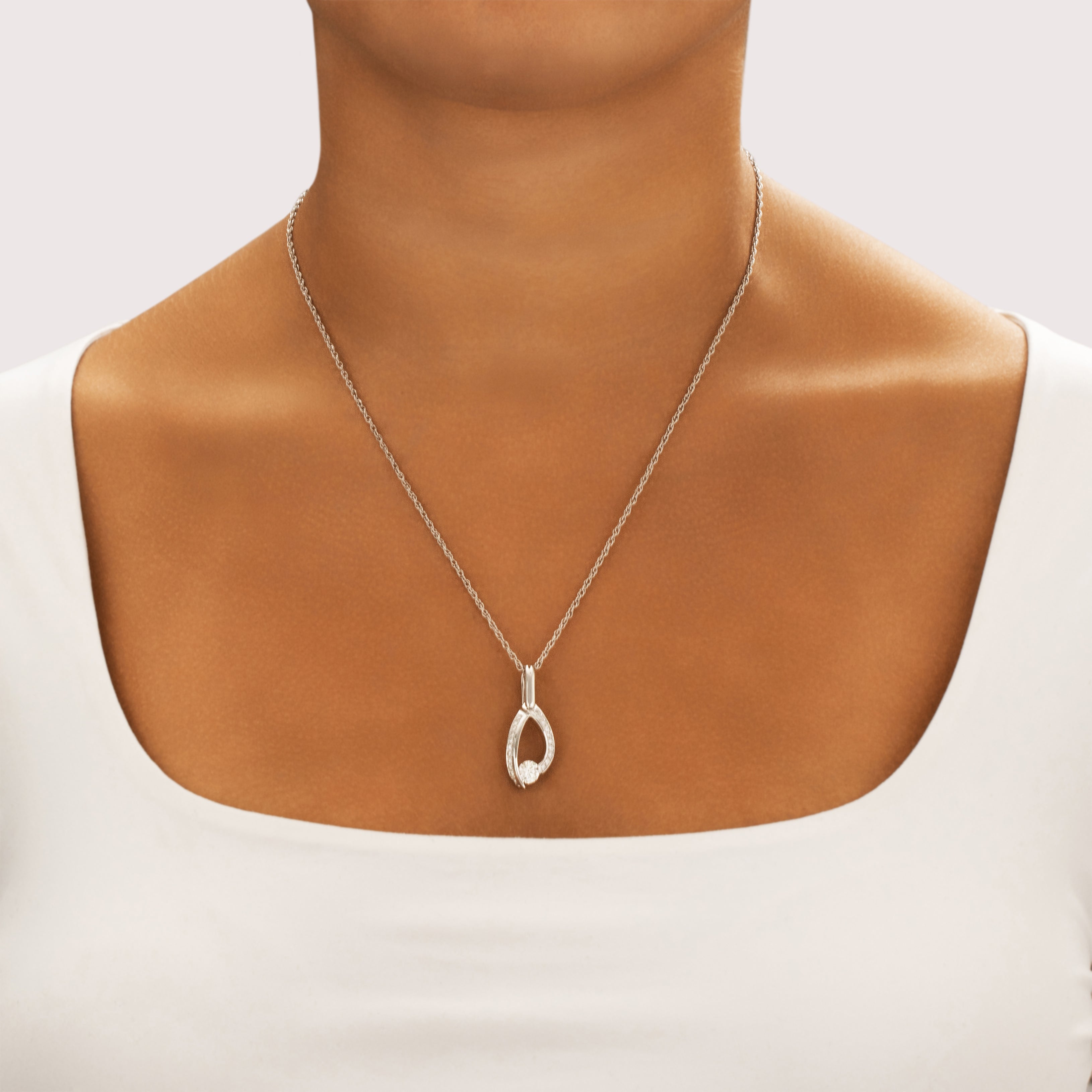 Vintage 14k White Gold .98cttw Diamond Dazzling Swooping Tension-Set Pendant - On model view
