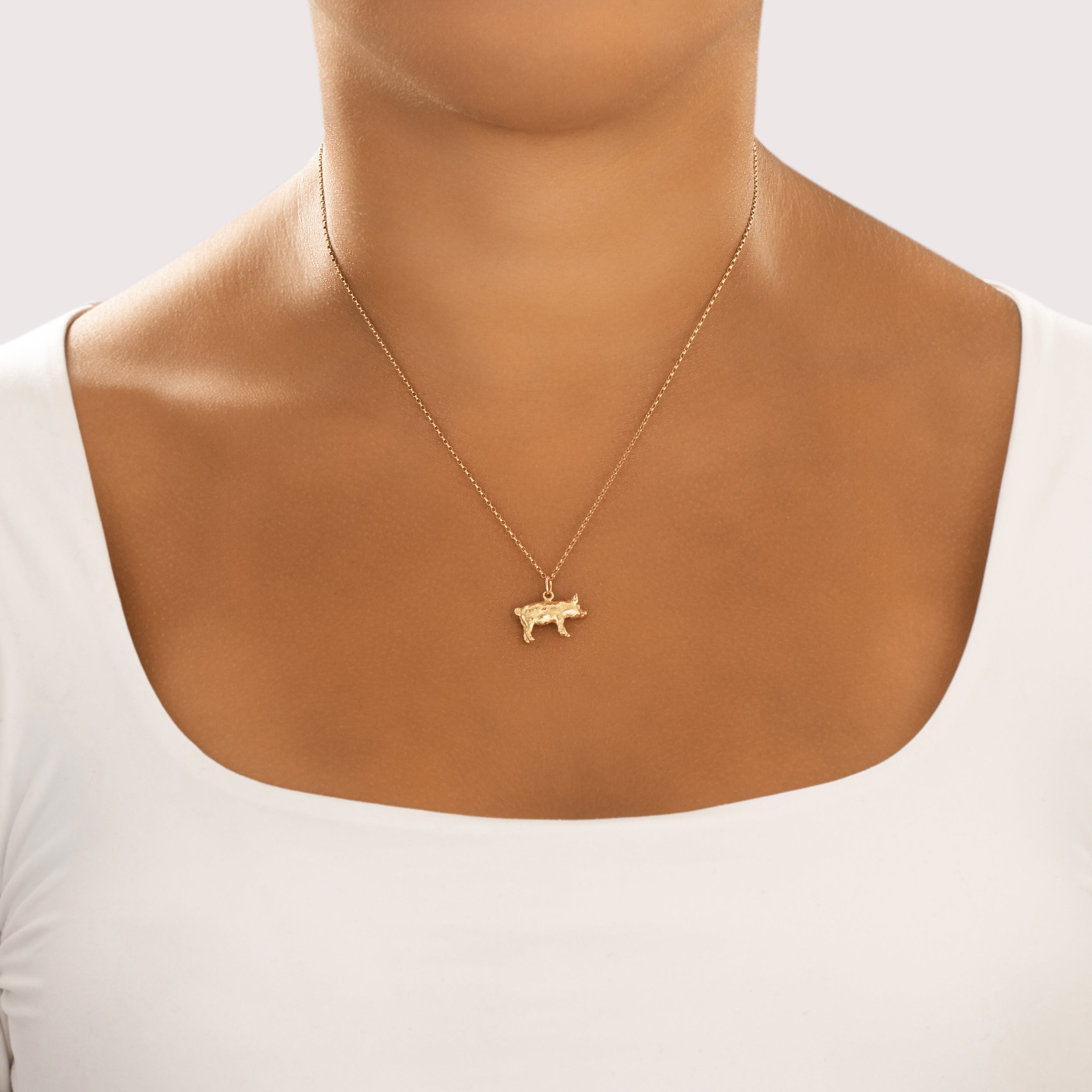 Vintage 14k Yellow Gold Friendly Figural Pig Charm / Pendant - On model view