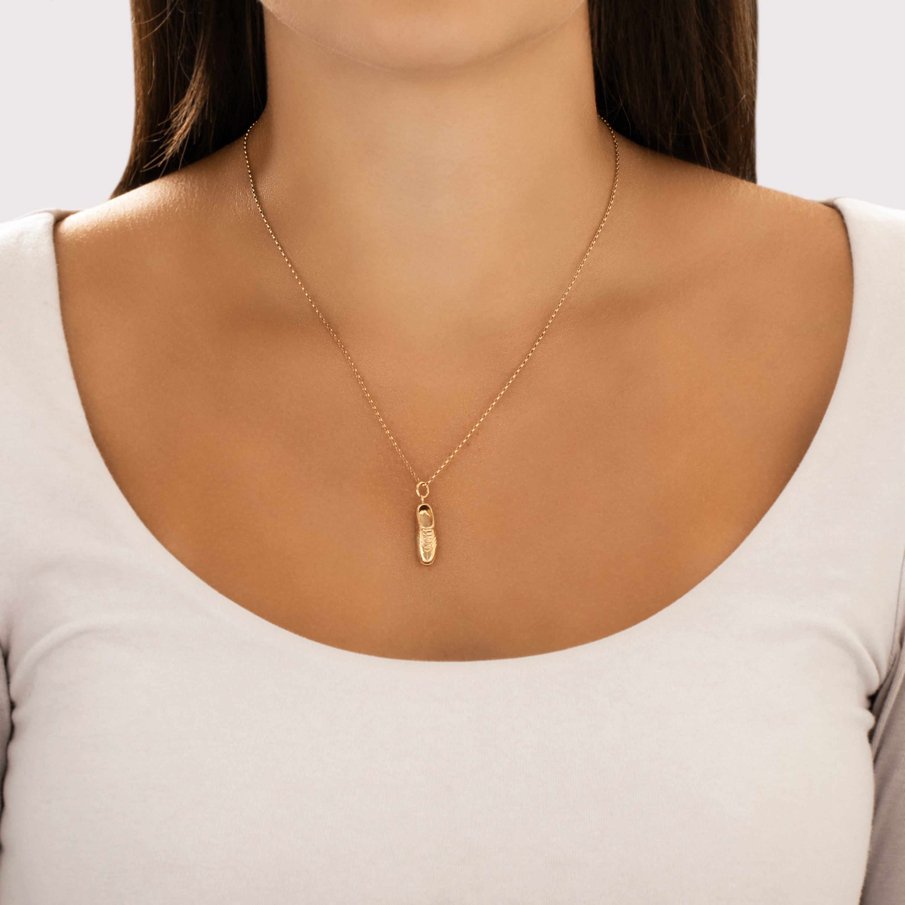 Vintage 14k Yellow Gold Dimensional Running Track Spike Shoe Charm / Pendant - On model view