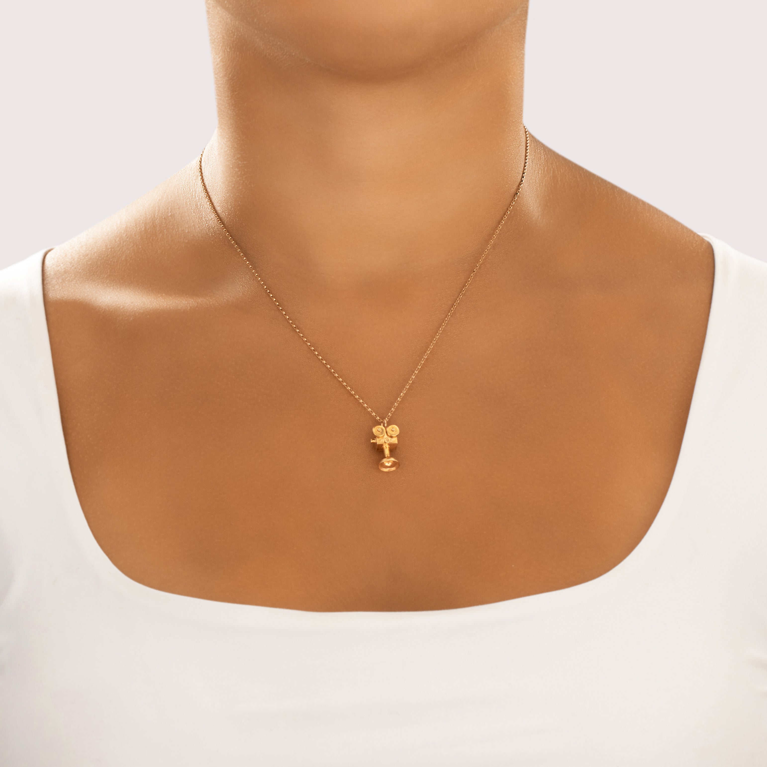 Vintage 14k Yellow Gold Wonderful Articulated Movie Film Camera Charm / Pendant - On model view