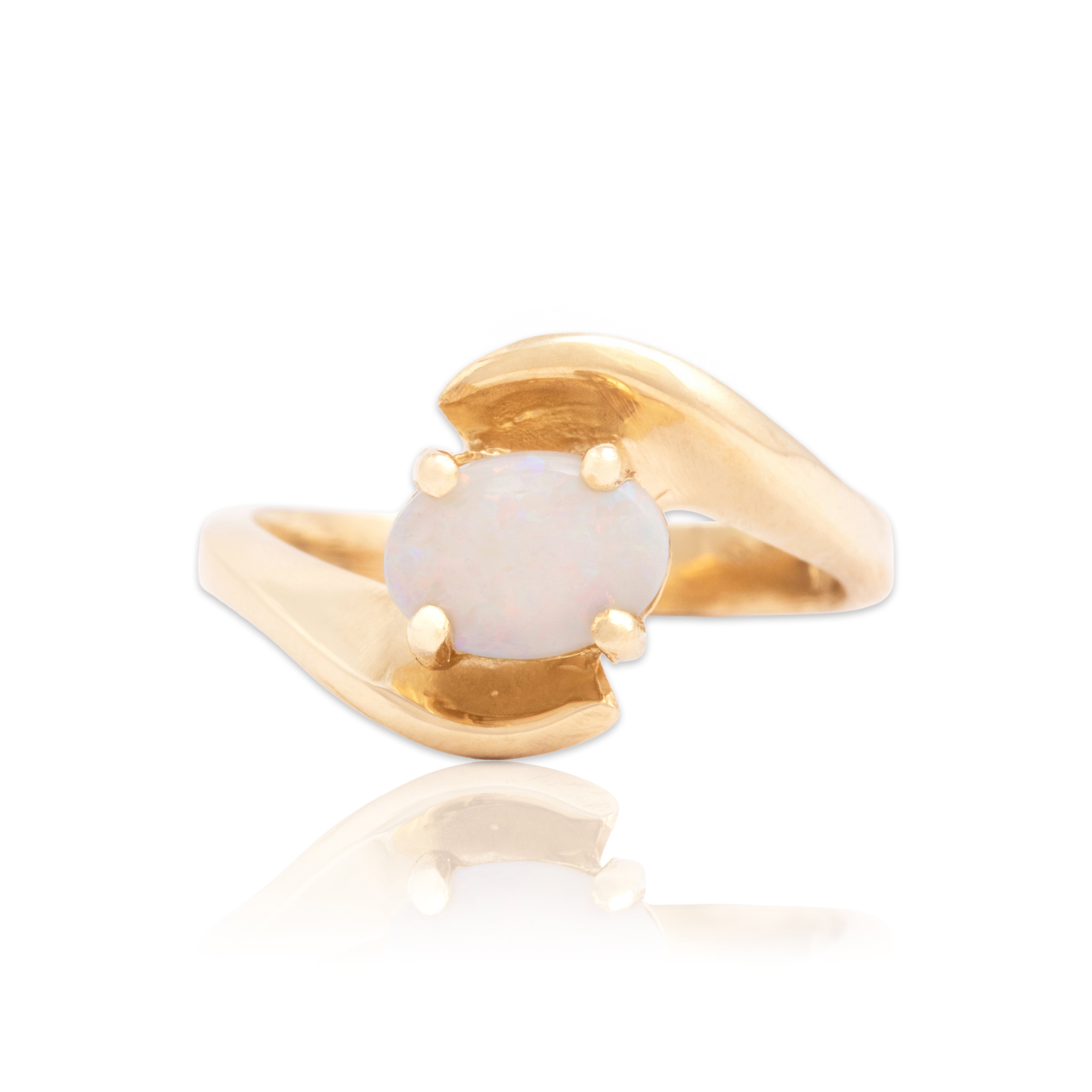 Vintage 14k Yellow Gold .54ct Opal Flashing East-West Bypass Ring - Close-up view