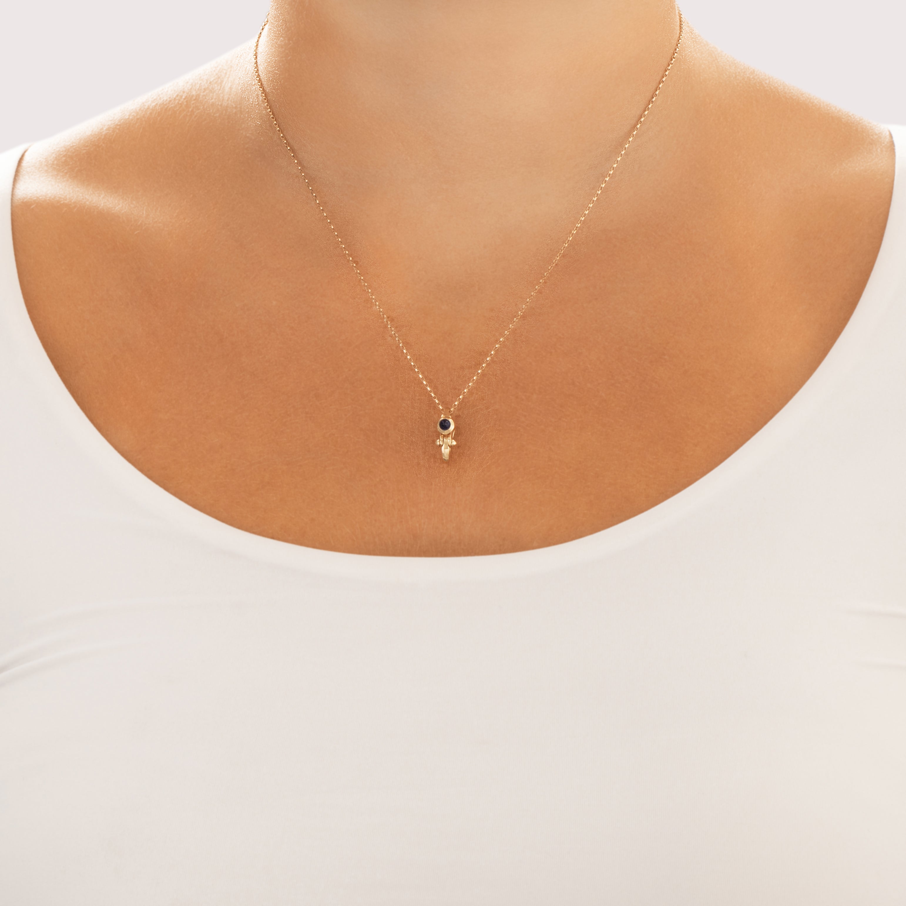 Vintage 14k Yellow Gold Blue Synthetic Sapphire Sleek Cabochon Charm Clip Charm / Pendant - On model view