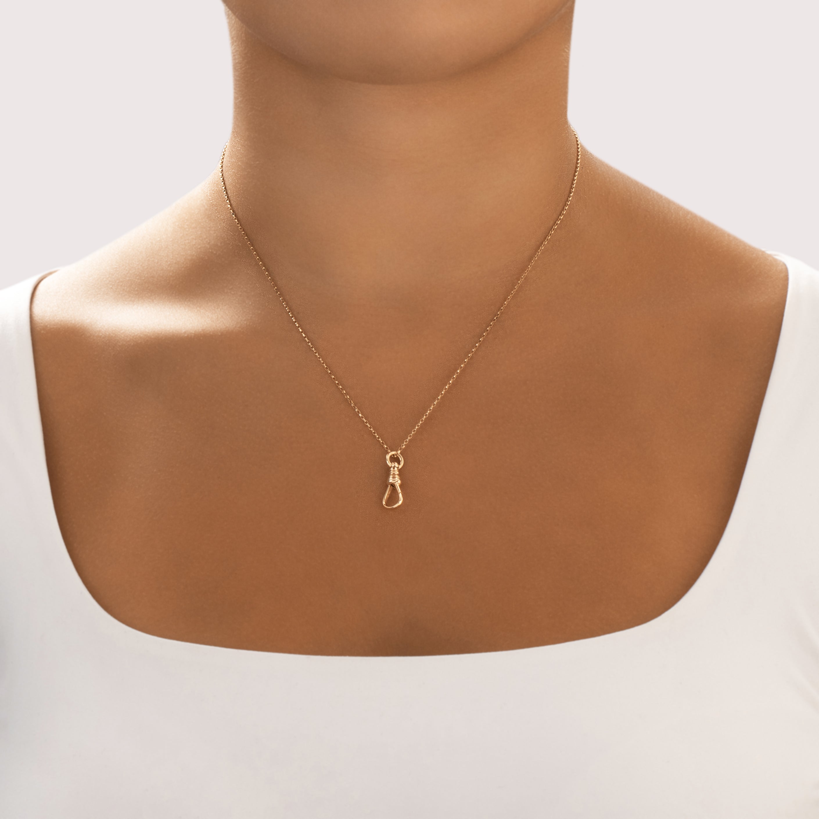 Antique 14k Yellow Gold Swiveling Dog Clip Charm Holder Pendant - On model view