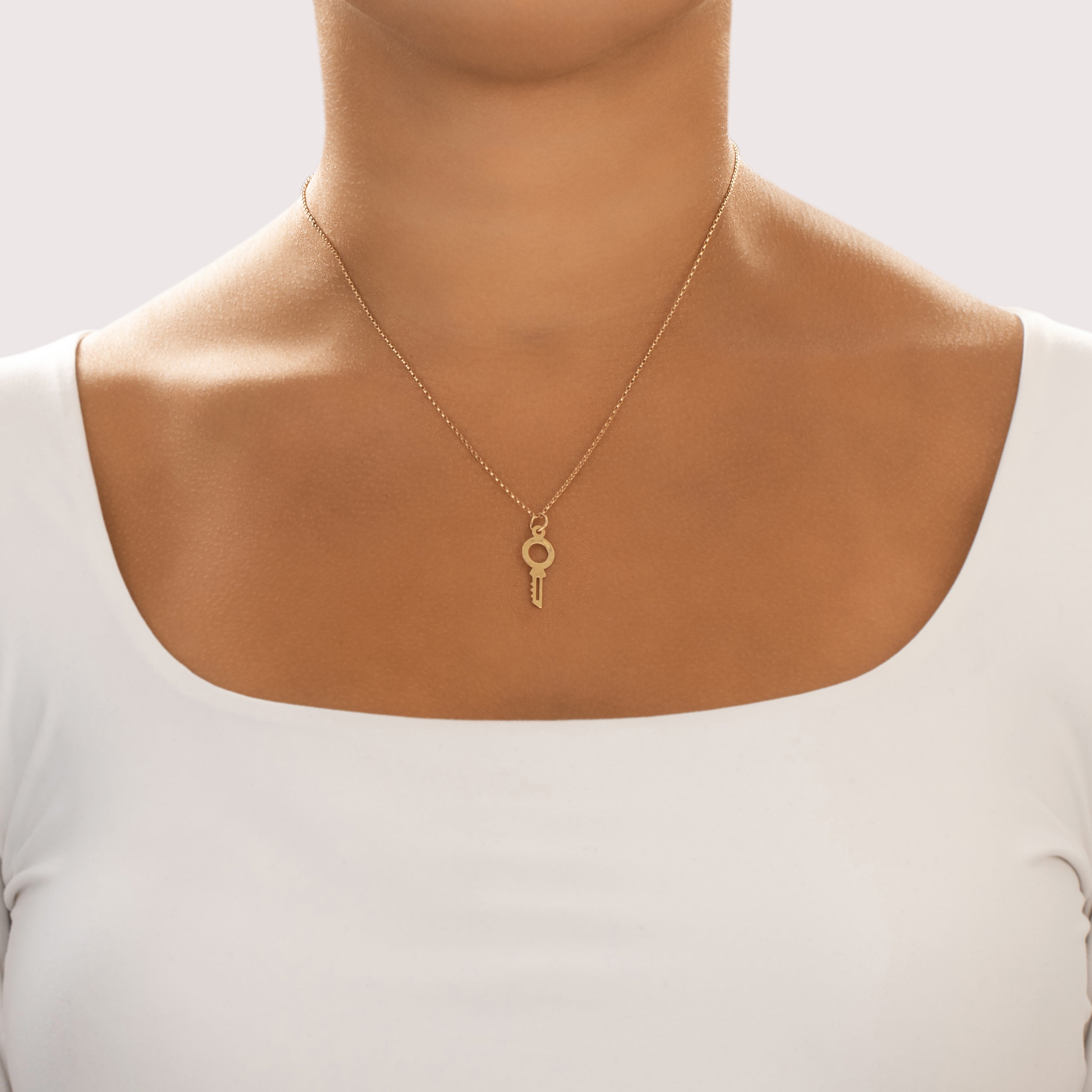 Vintage 18k Yellow Gold Sleek Key Charm / Pendant - On model view