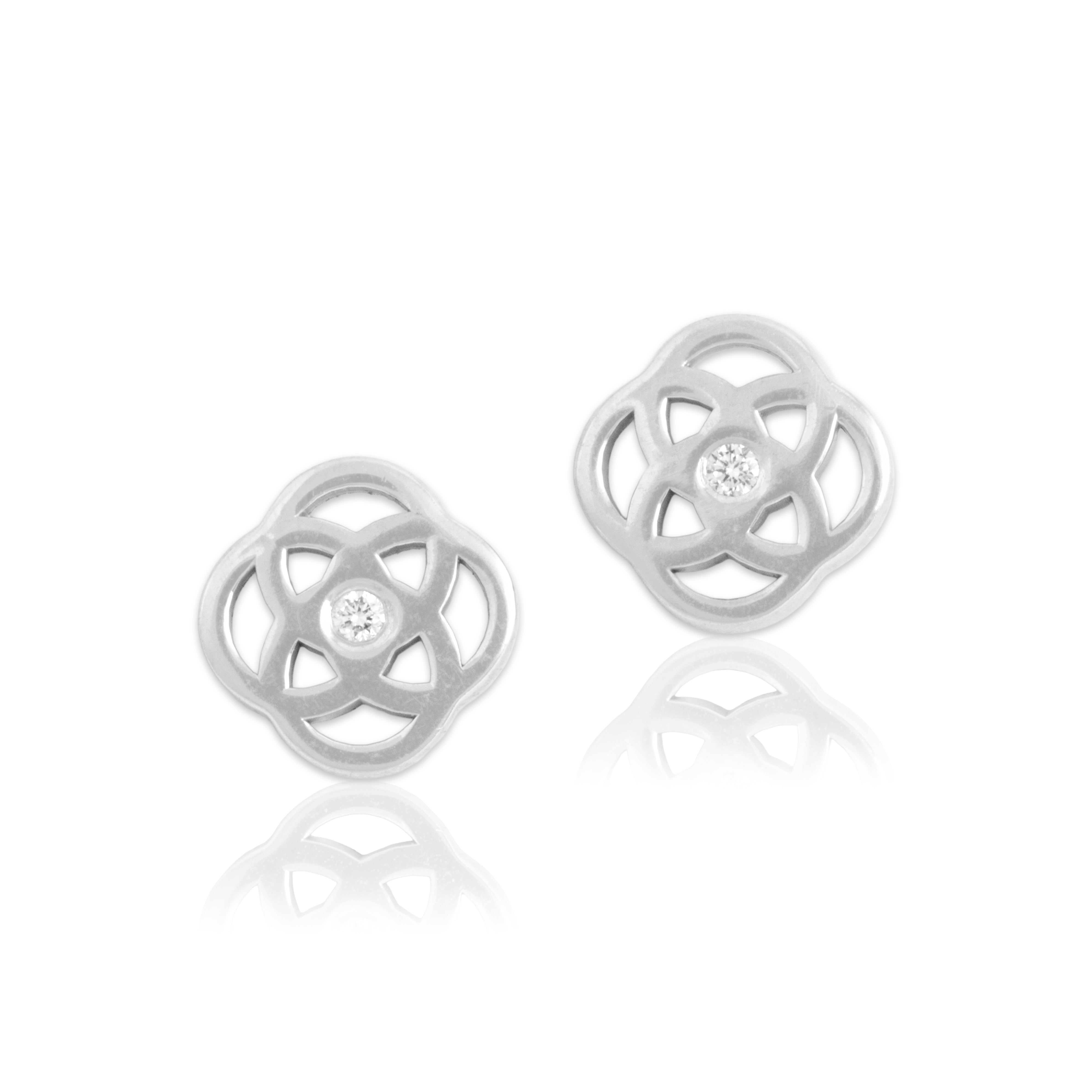 Estate Small 18k White Gold Diamond Gleaming Quatrefoil Knot Stud Earrings - Close-up view