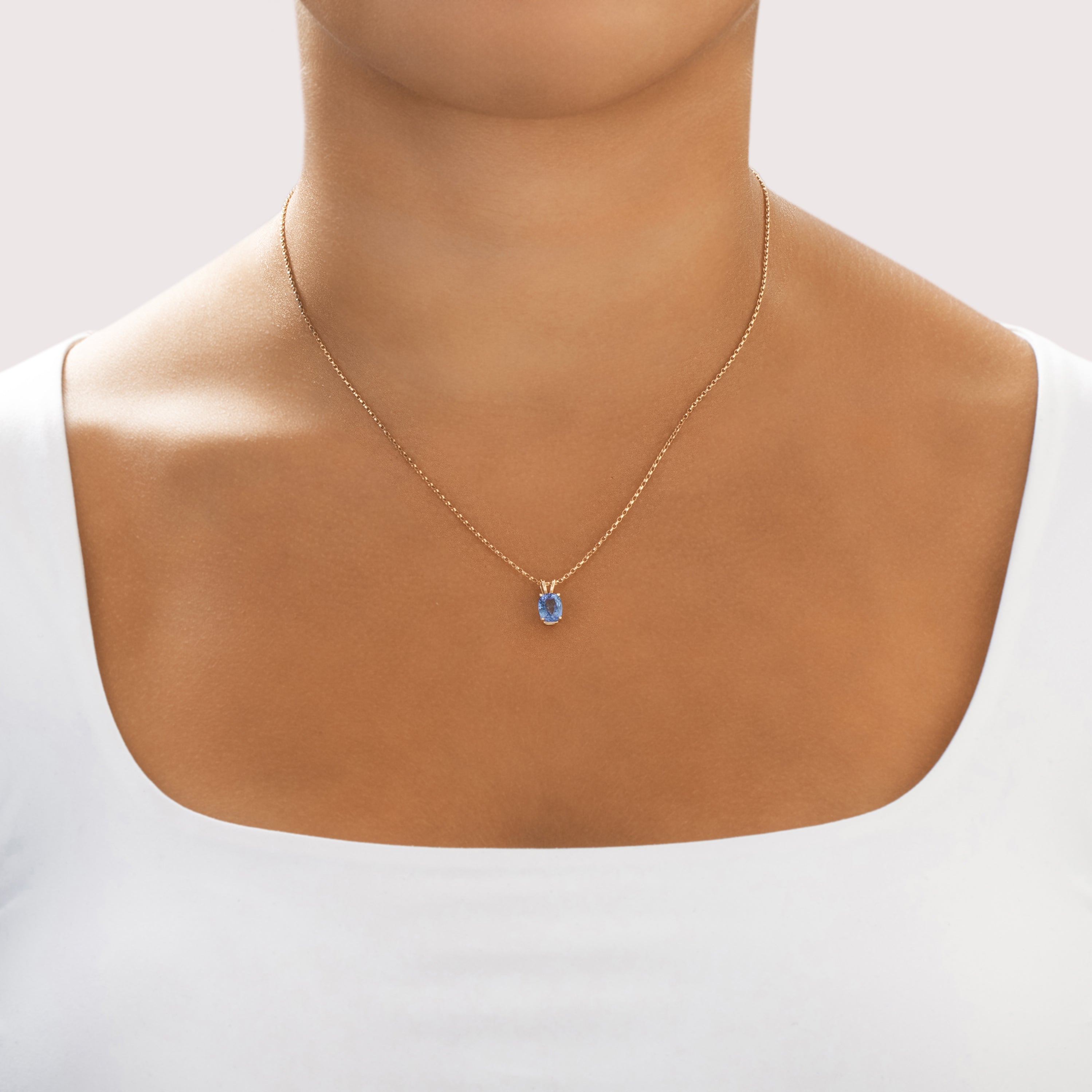 Vintage Small 14k Yellow Gold 1.46ct Pale Blue Sapphire Vibrant Oval Pendant - On model view
