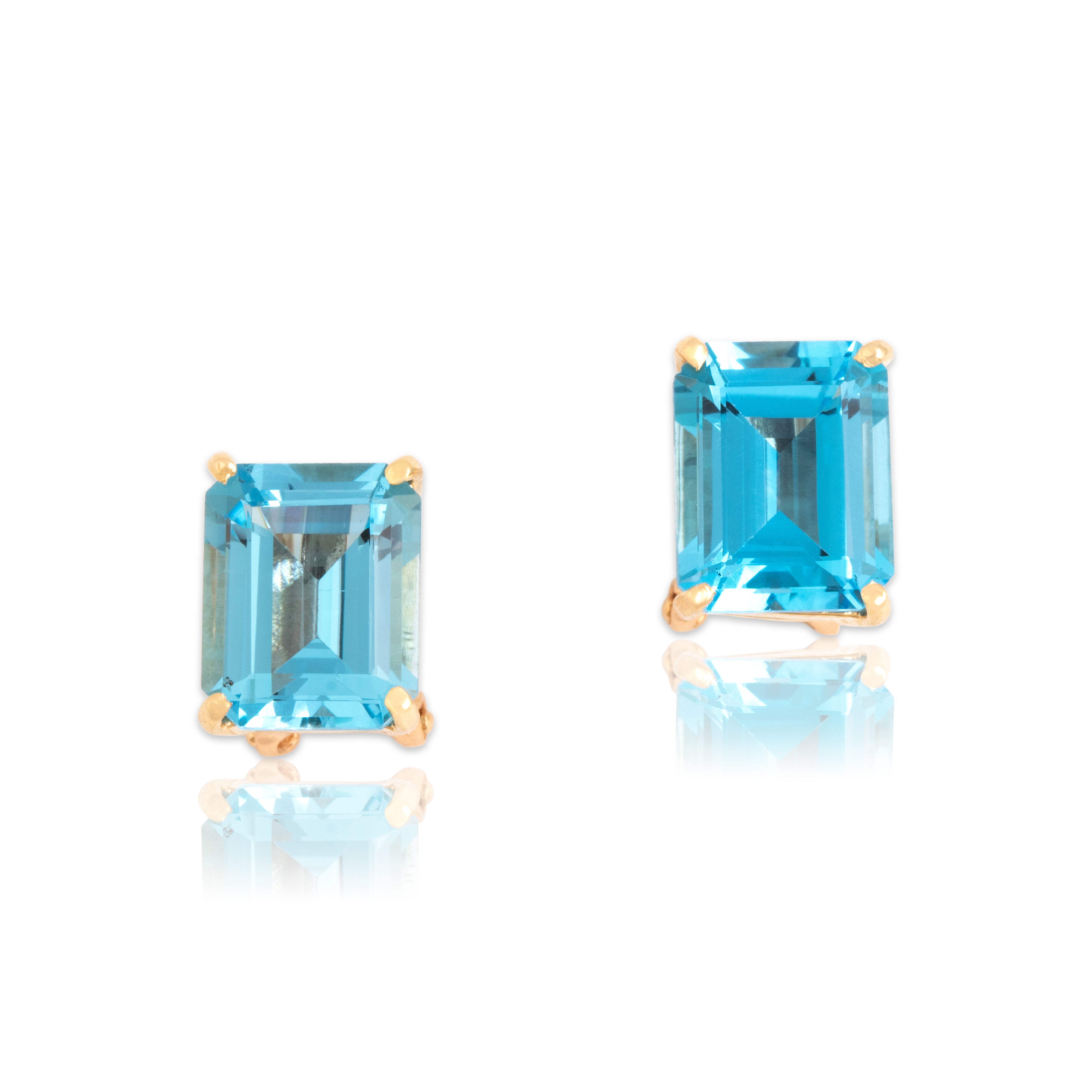 Vintage 14k Yellow Gold 8.37cttw Blue Topaz Vivid Solitaire Omega-Back Earrings - Close-up view