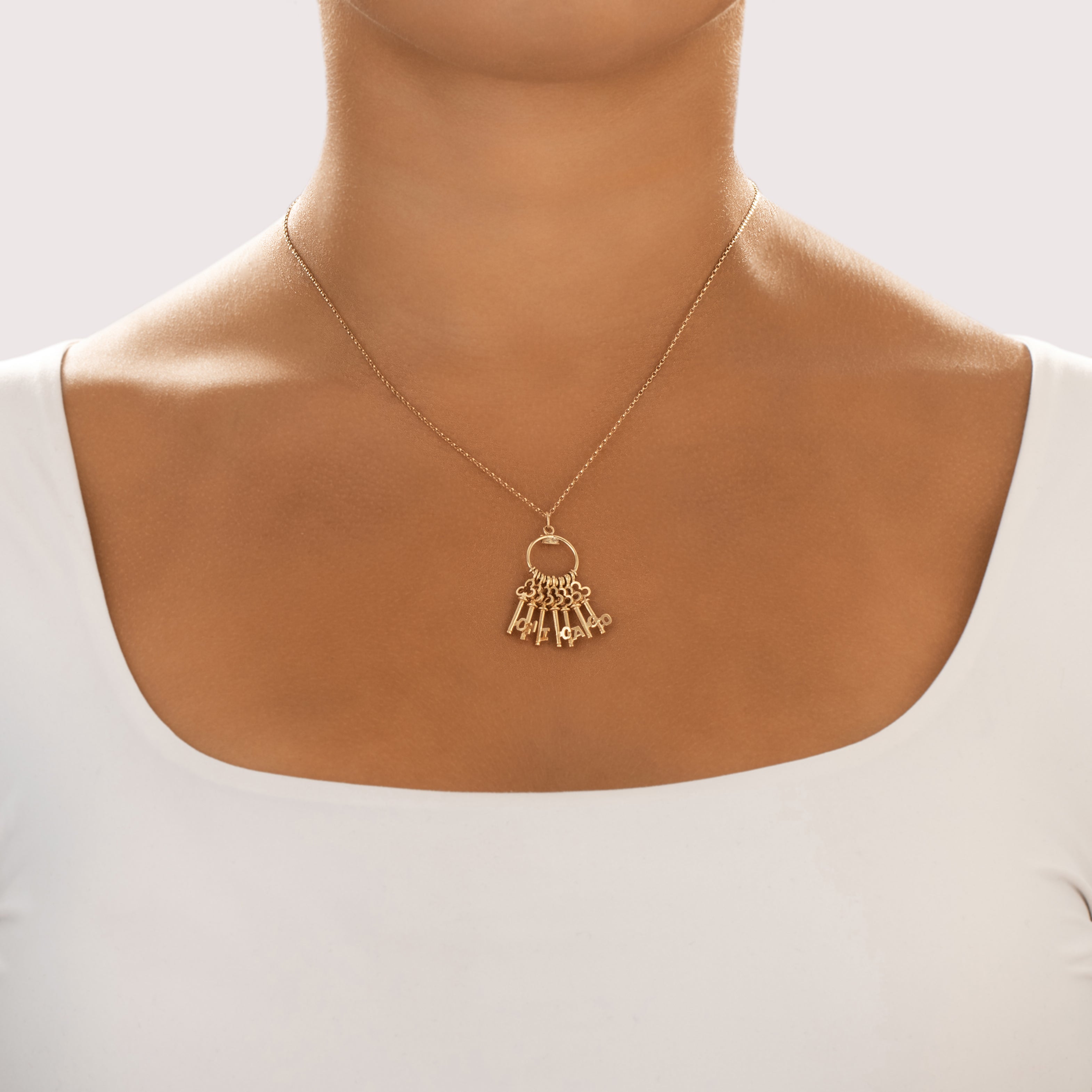 Vintage 14k Yellow Gold Chicago Skeleton Key Ring Charm / Pendant - On model view