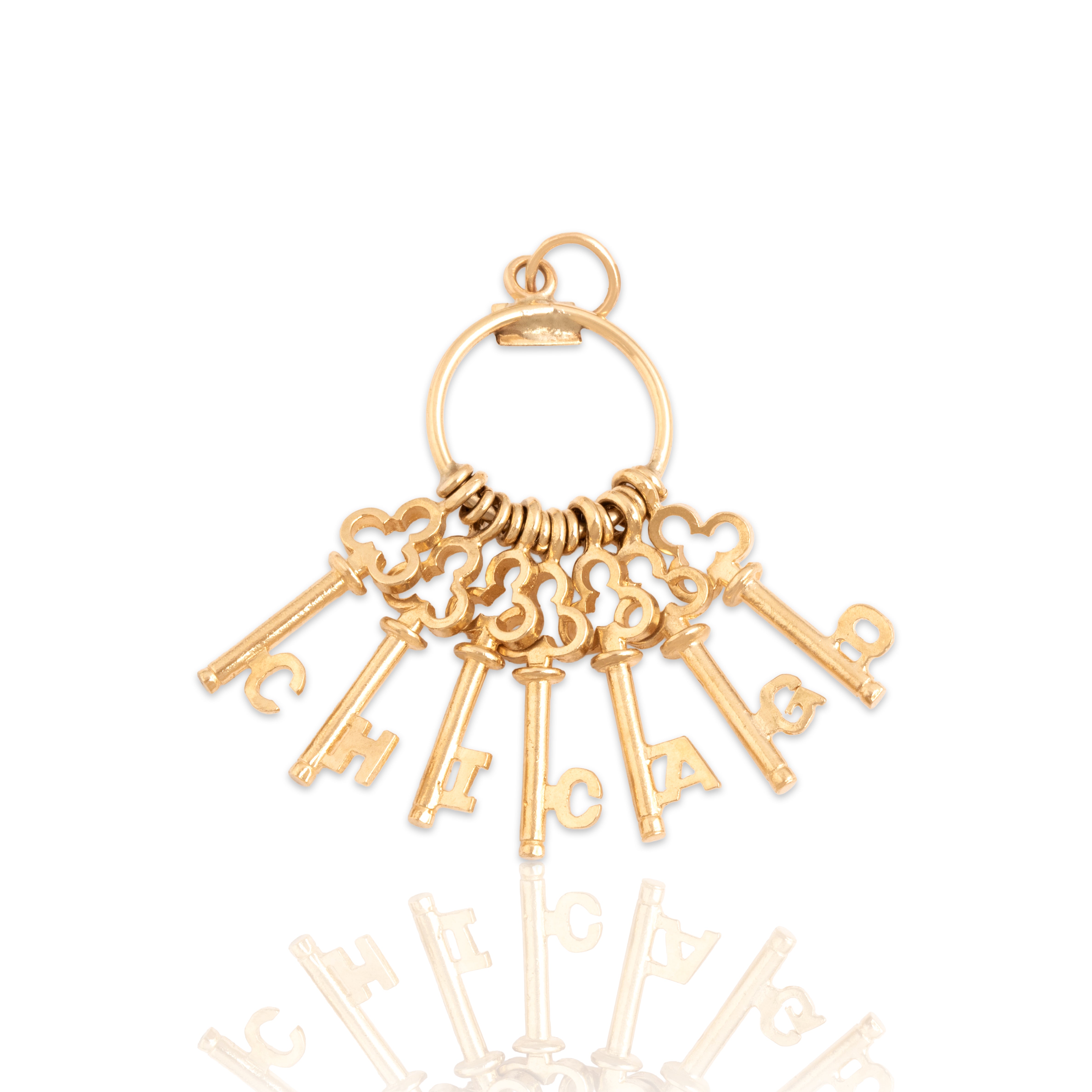 Vintage 14k Yellow Gold Chicago Skeleton Key Ring Charm / Pendant - Close-up view