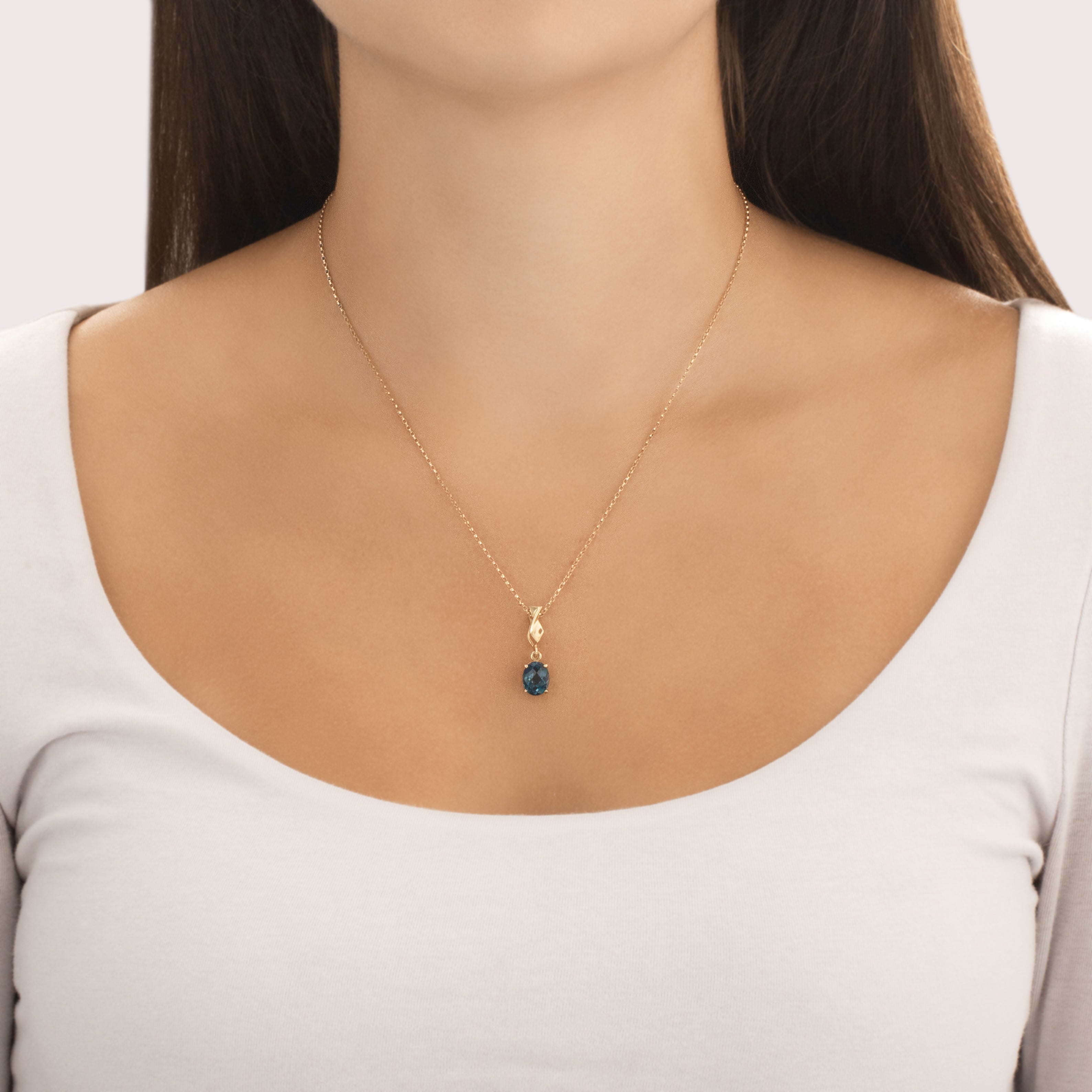 Vintage 14k & 10k Yellow Gold 2.73ct London Blue Topaz Checkerboard Solitaire Twist Dangle Pendant - On model view