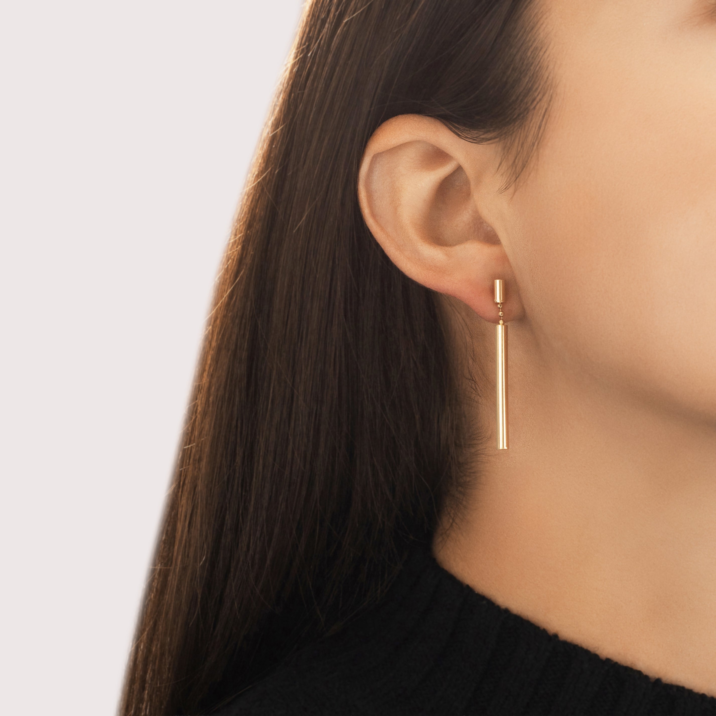 Vintage 14k Yellow Gold Sleek Tubal Dangle Earrings - On model view