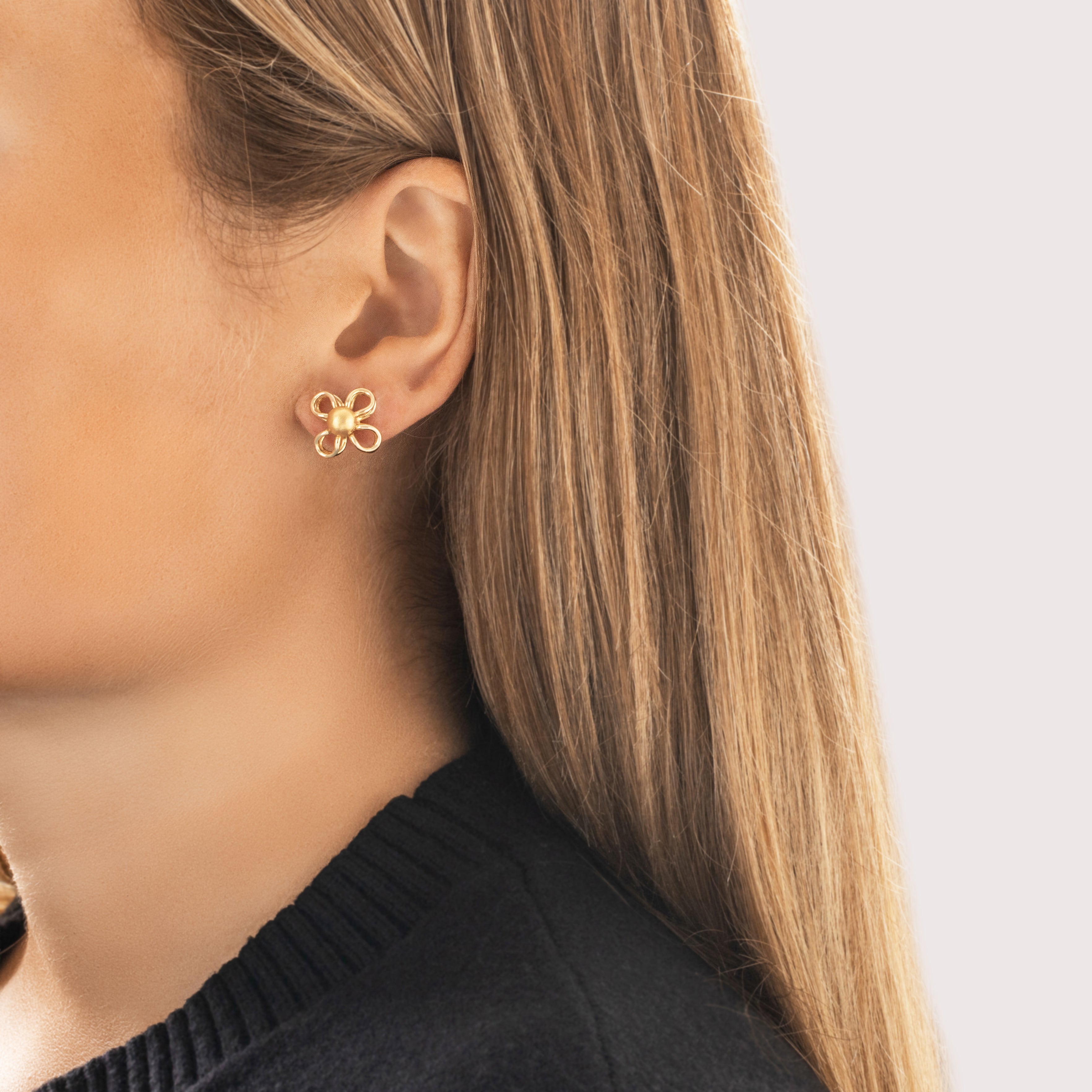 Vintage Italian 14k Yellow Gold Chic Brushed Looping Flower Stud Earrings - On model view