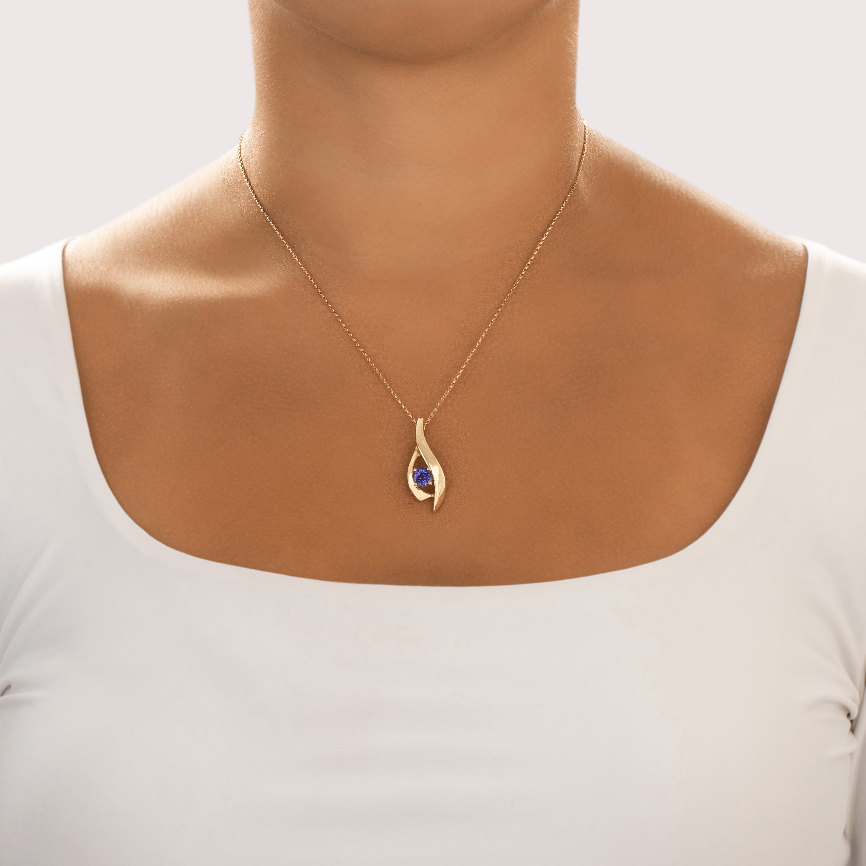 Vintage 14k Yellow Gold 1.25ct Tanzanite Elegant Flowing Vivid Pendant - On model view