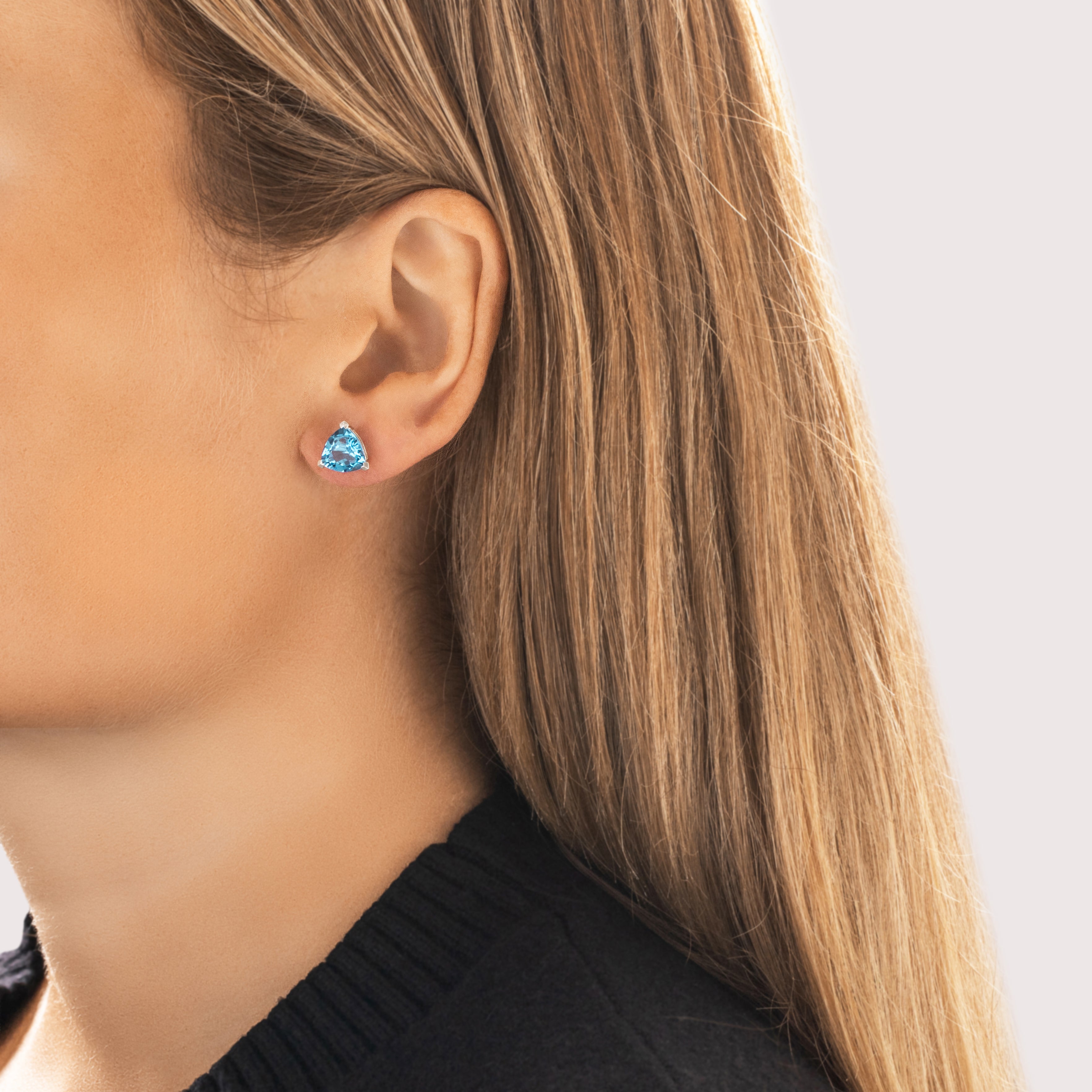 Vintage 14k White Gold 3.68cttw Blue Topaz Vibrant Triangular Stud Earrings - On model view