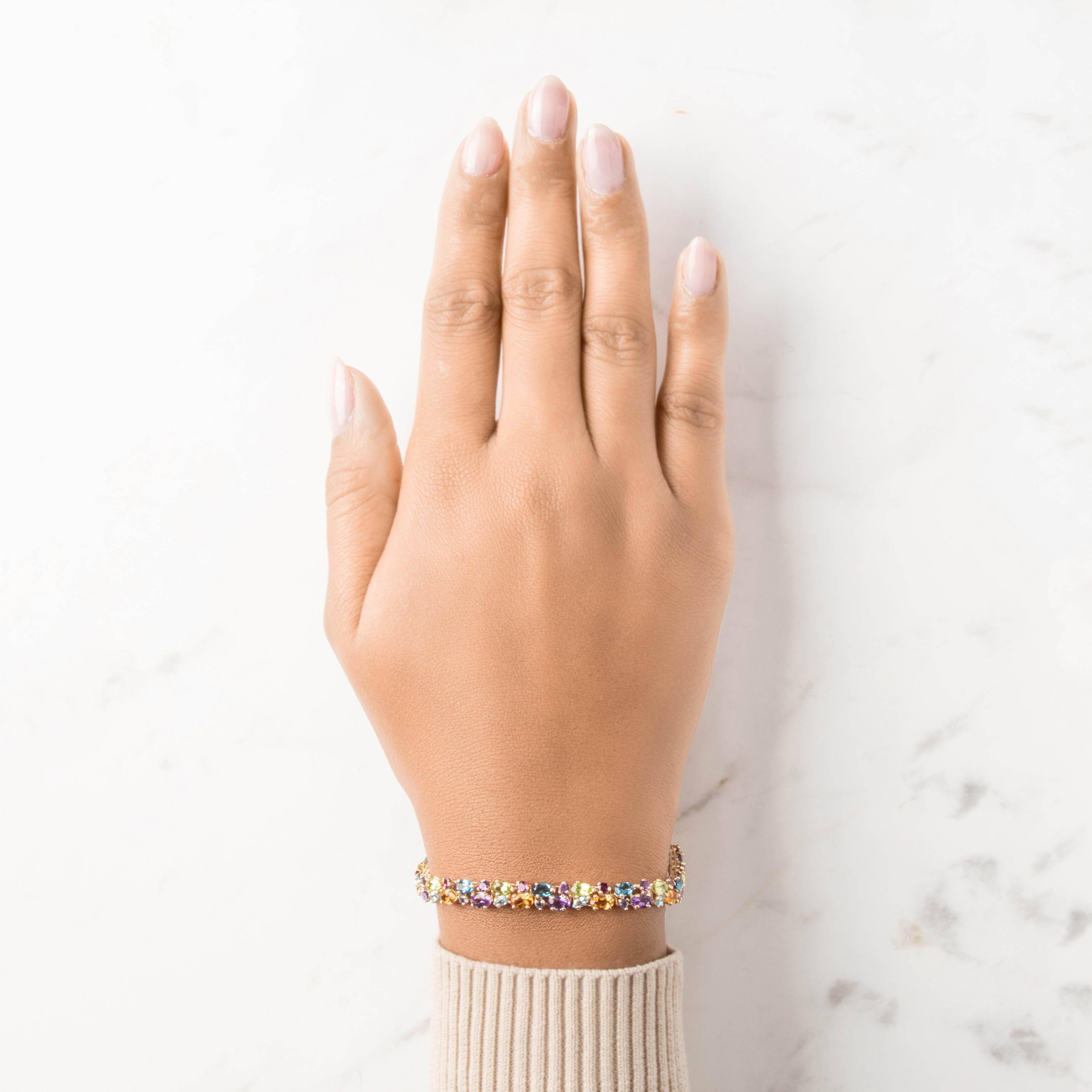 Vintage 14k Yellow Gold 2.97cttw Light Blue Topaz 2.38cttw Amethyst 2.23cttw Green Peridot 2.12cttw Citrine .6cttw Pink Garnet Blue Purple Iolite Vibrant Multi-Cut Link Bracelet - On model view