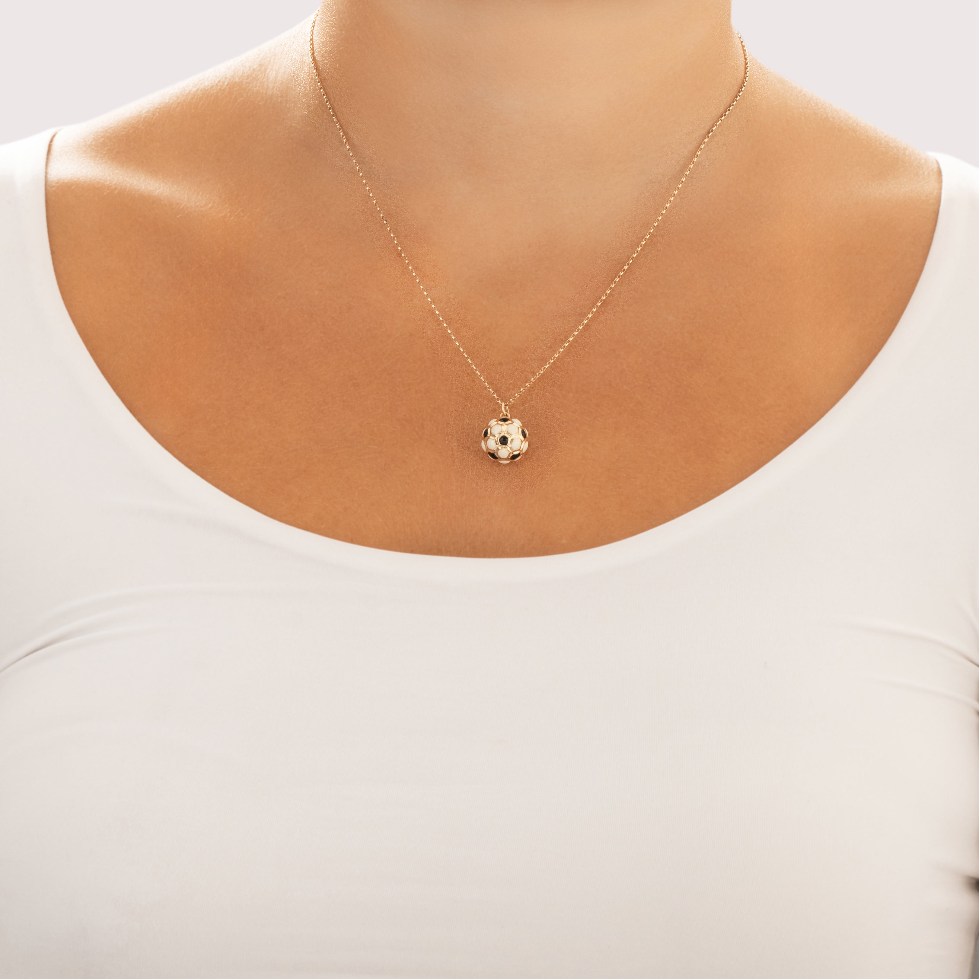 Vintage Lightweight 14k Yellow Gold Enamel Soccer Ball Charm / Pendant - On model view