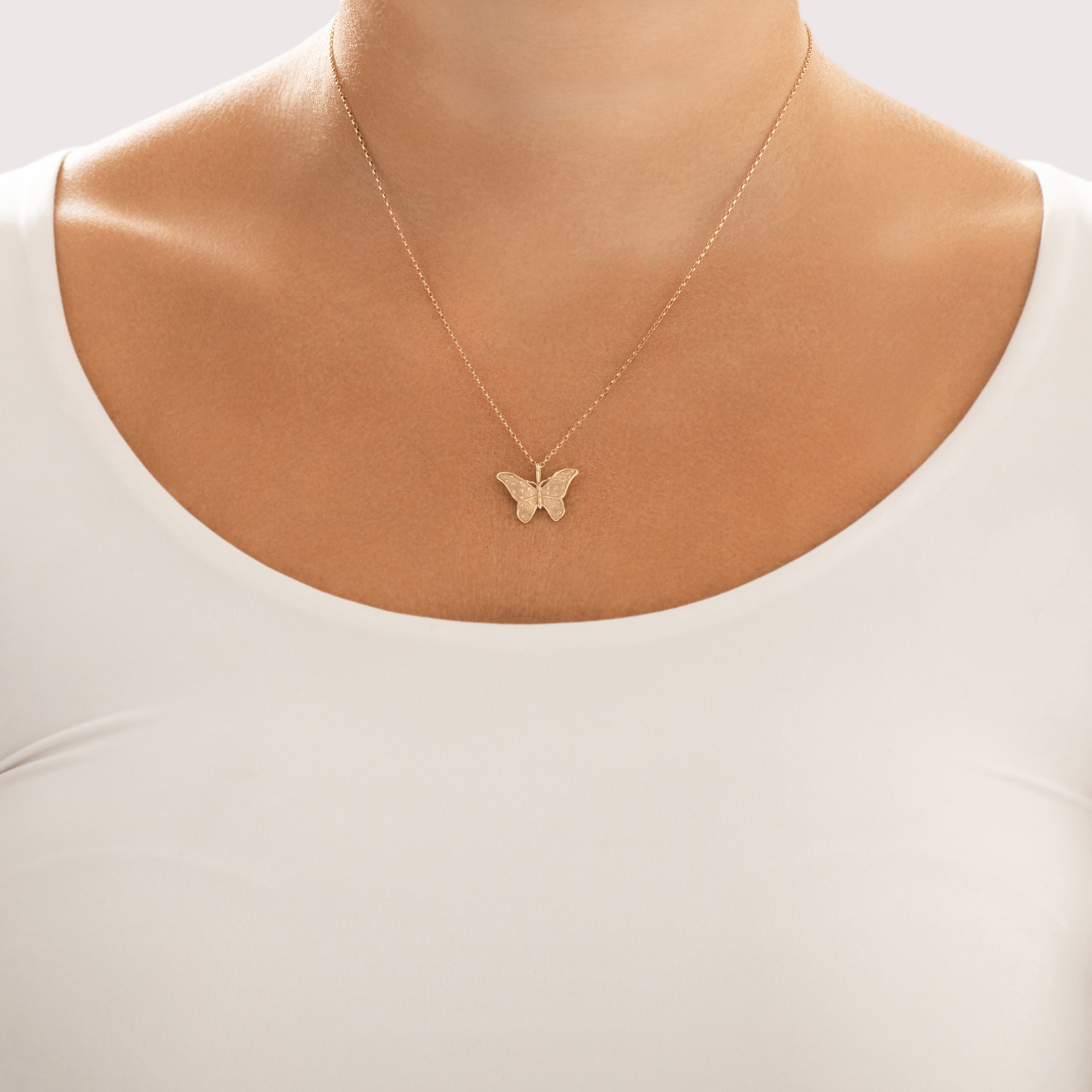 Vintage 14k Yellow Gold Soaring Spotted Butterfly Pendant - On model view