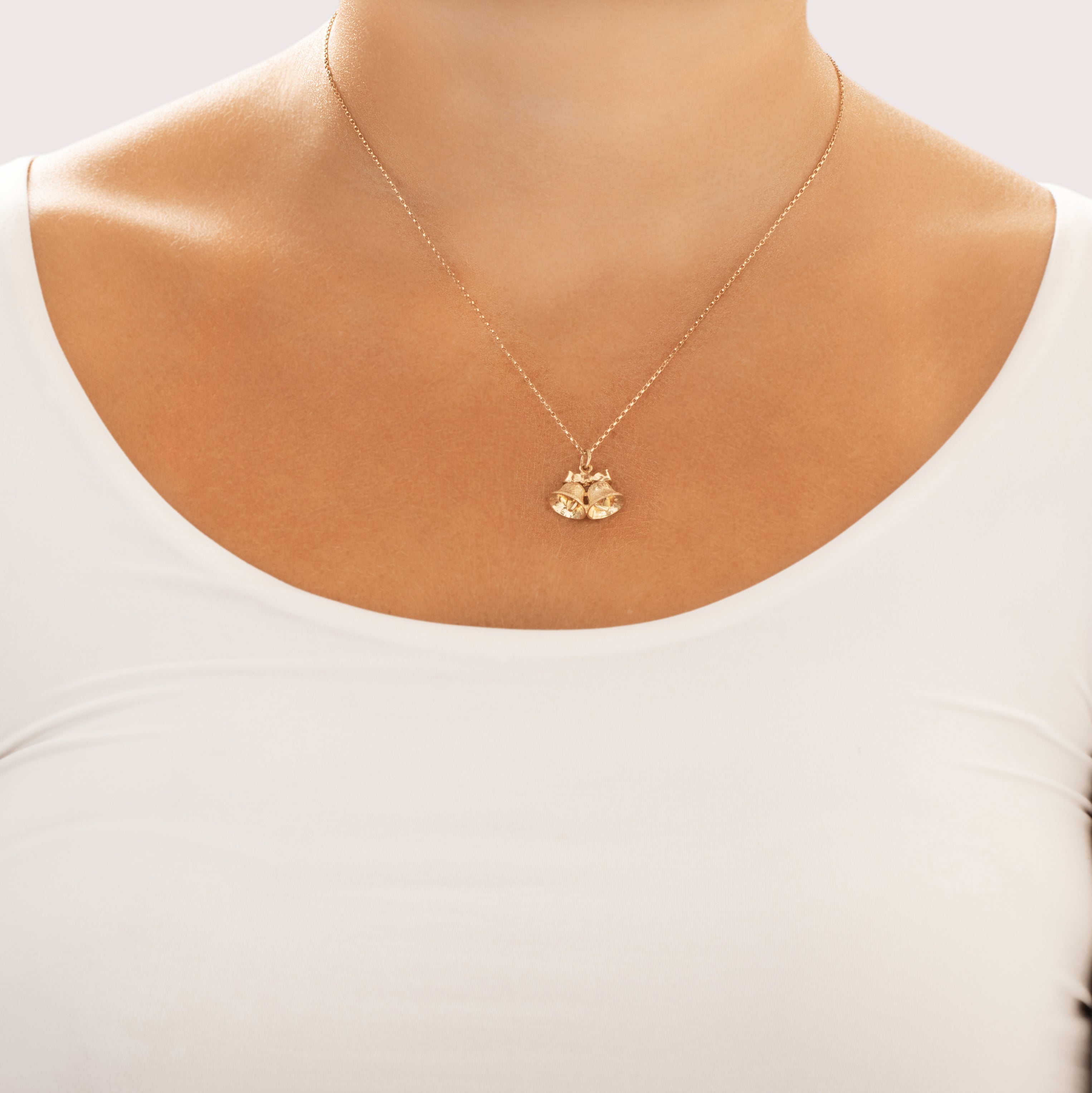 Vintage 14k Yellow Gold Jolly Ringing Bells Charm / Pendant - On model view