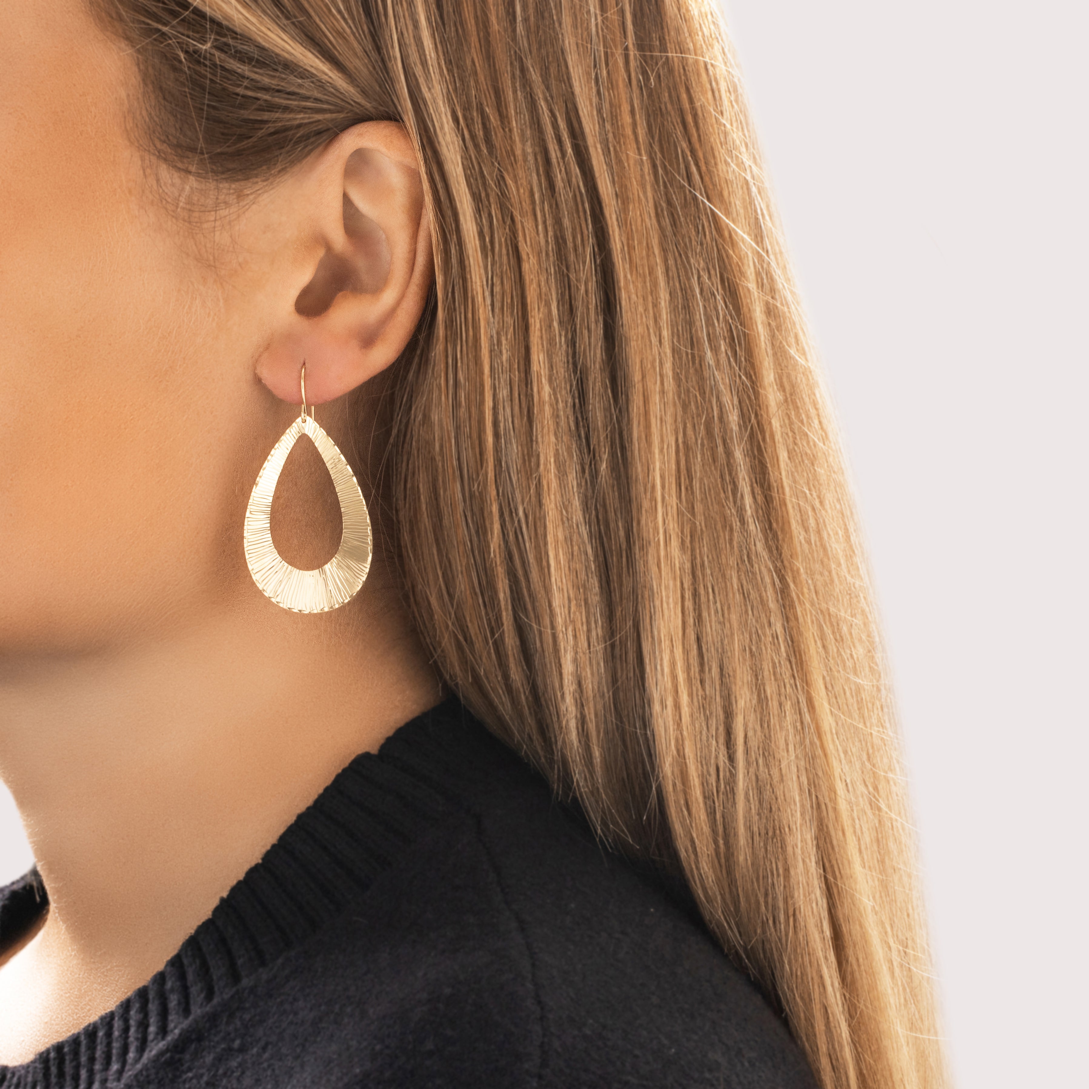 Vintage Lightweight 14k Yellow Gold Textured Groovy Teardrop Dangle Earrings - On model view