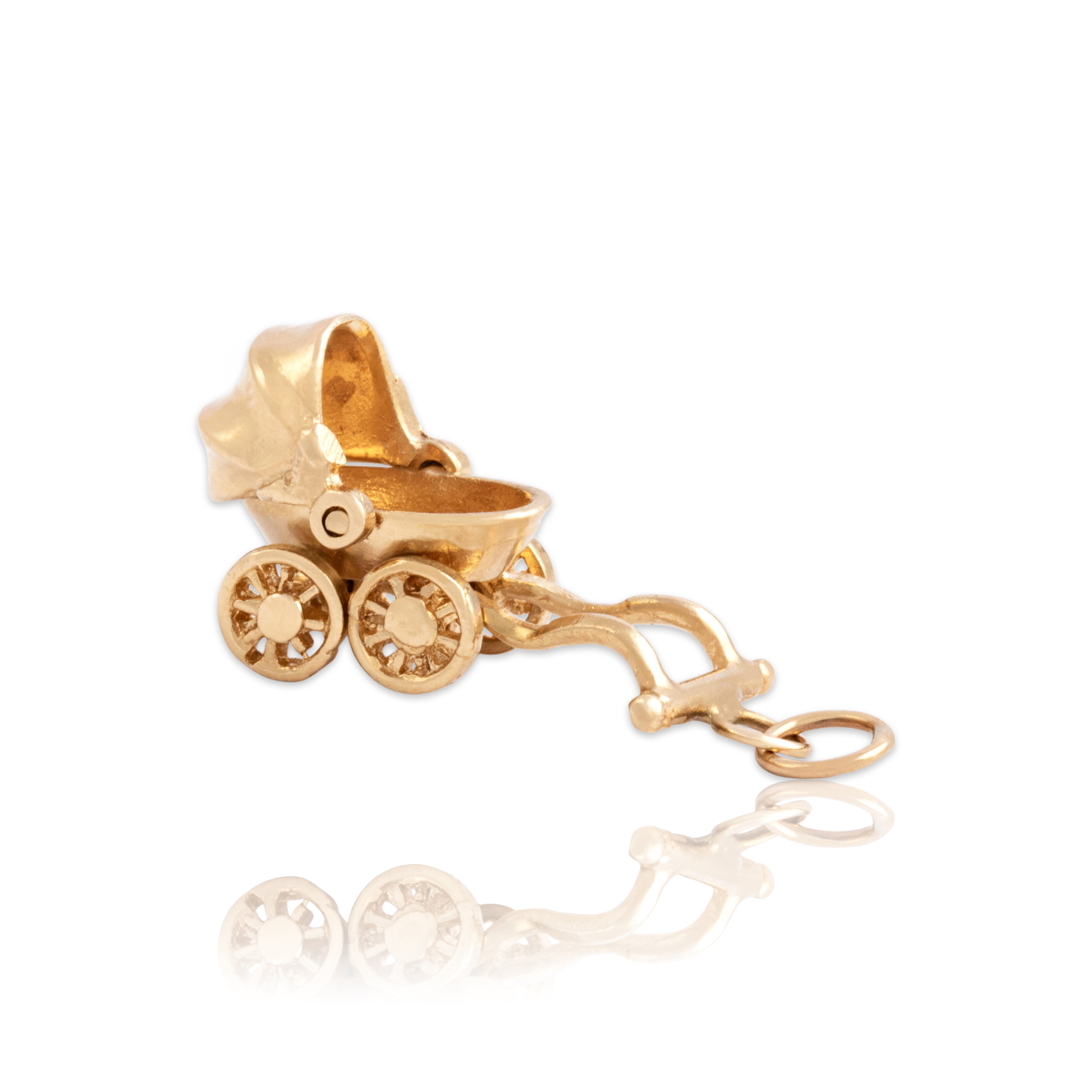 Vintage 14k Yellow Gold Adorable Articulating Baby Carriage Charm / Pendant - Close-up view