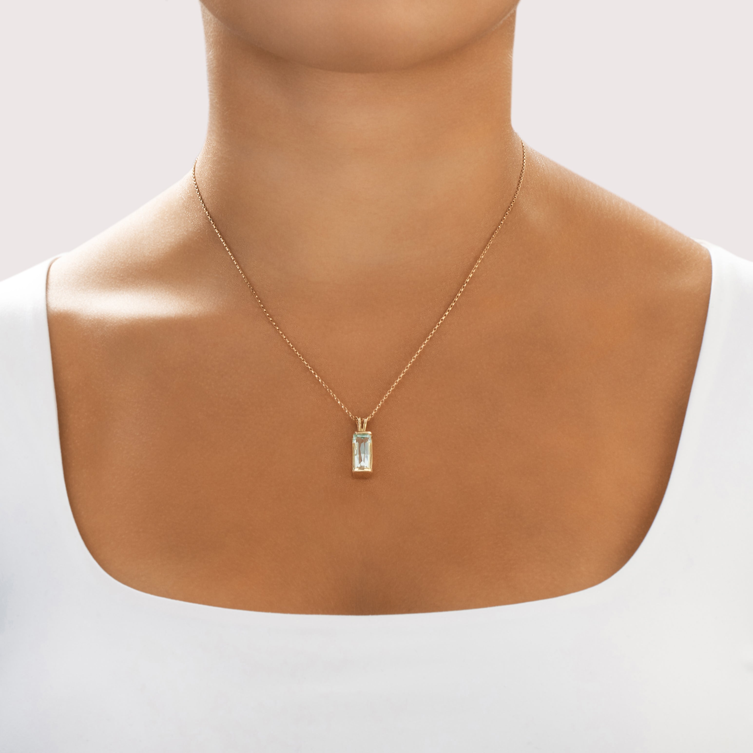 Vintage 14k Yellow Gold 4.71ct Aquamarine Flashing Elongated Modern Cut Pendant - On model view